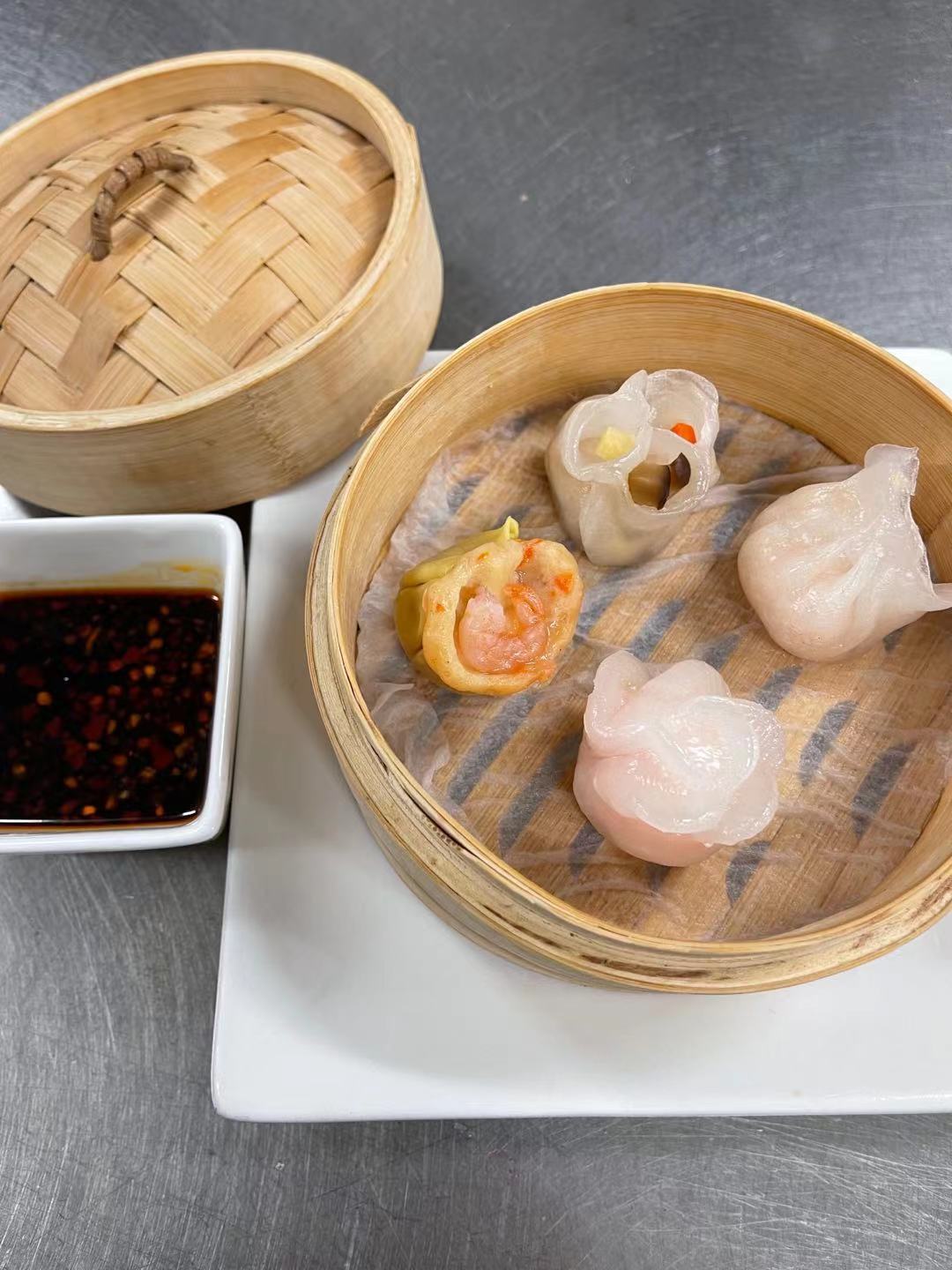 Order 21. Four Xi Dumplings四喜饺子 food online from Cathay House store, Waco on bringmethat.com