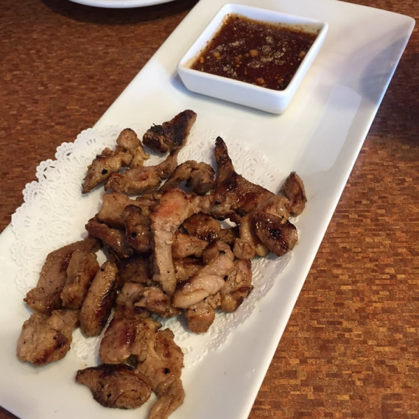 Order Grilled Pork Neck food online from Chaba Thai Kitchen store, San Diego on bringmethat.com