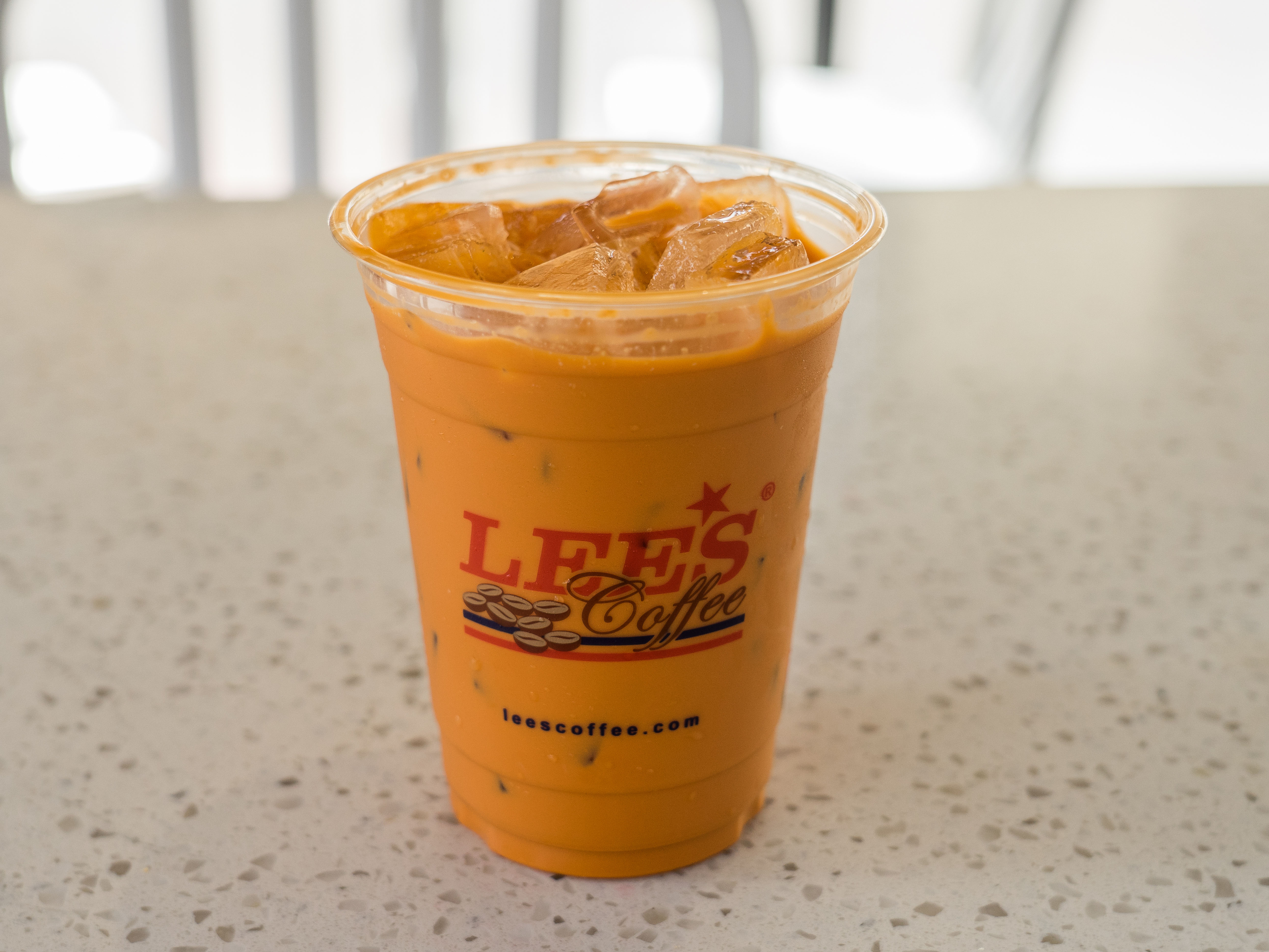 Order Thai Iced Tea food online from Lee Sandwiches store, Corona on bringmethat.com