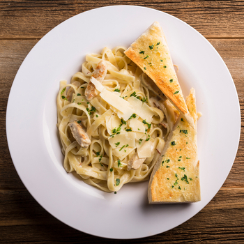 Order Fettuccine Alfredo with Grilled Chicken food online from Rosati's Pizza store, Chicago on bringmethat.com