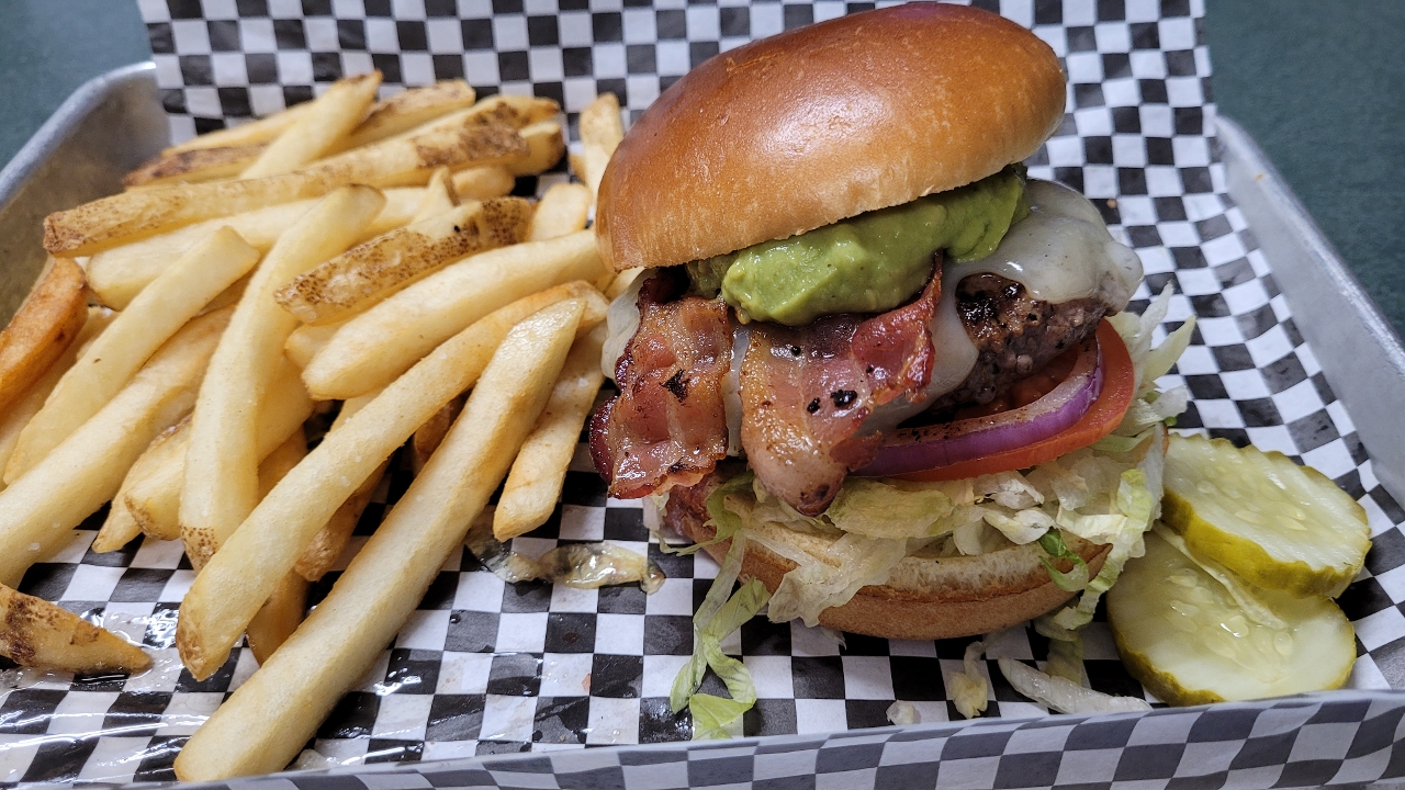 Order *Guacamole Bacon Burger food online from The Distillery store, Syracuse on bringmethat.com