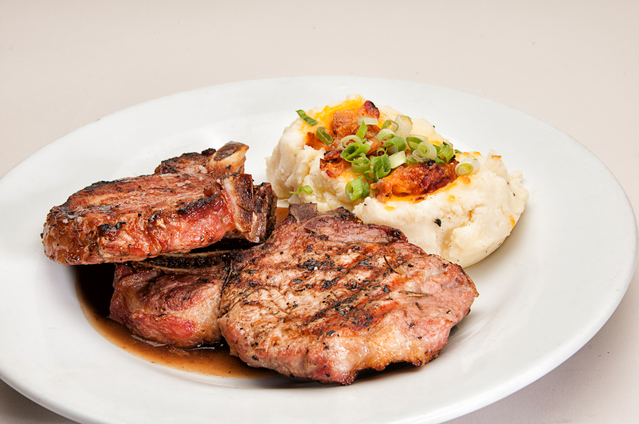 Order Center Grilled Pork Chops with Vegetables Dinner food online from Barraco store, Evergreen Park on bringmethat.com