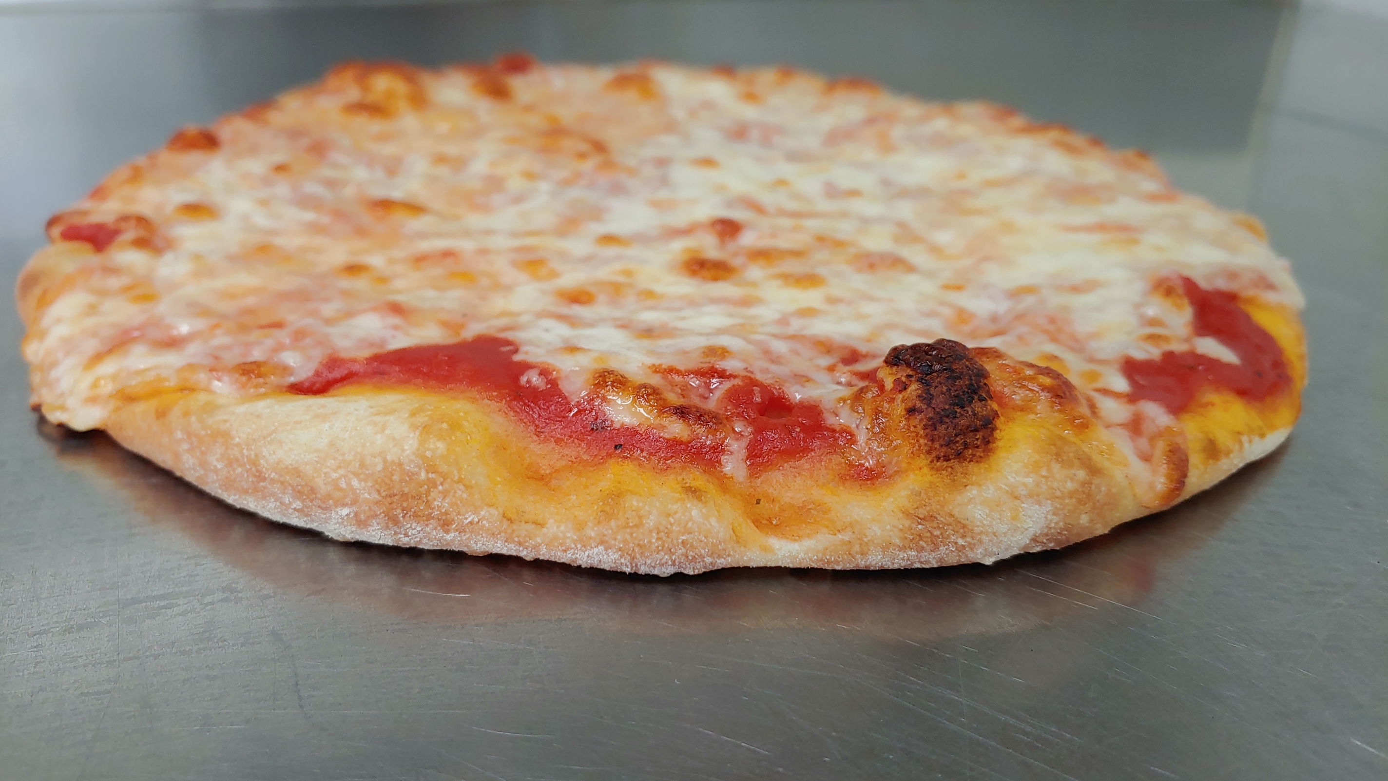Order 12" Cheese Pizza  food online from Gino's Pizzeria & Restaurant store, Astoria on bringmethat.com