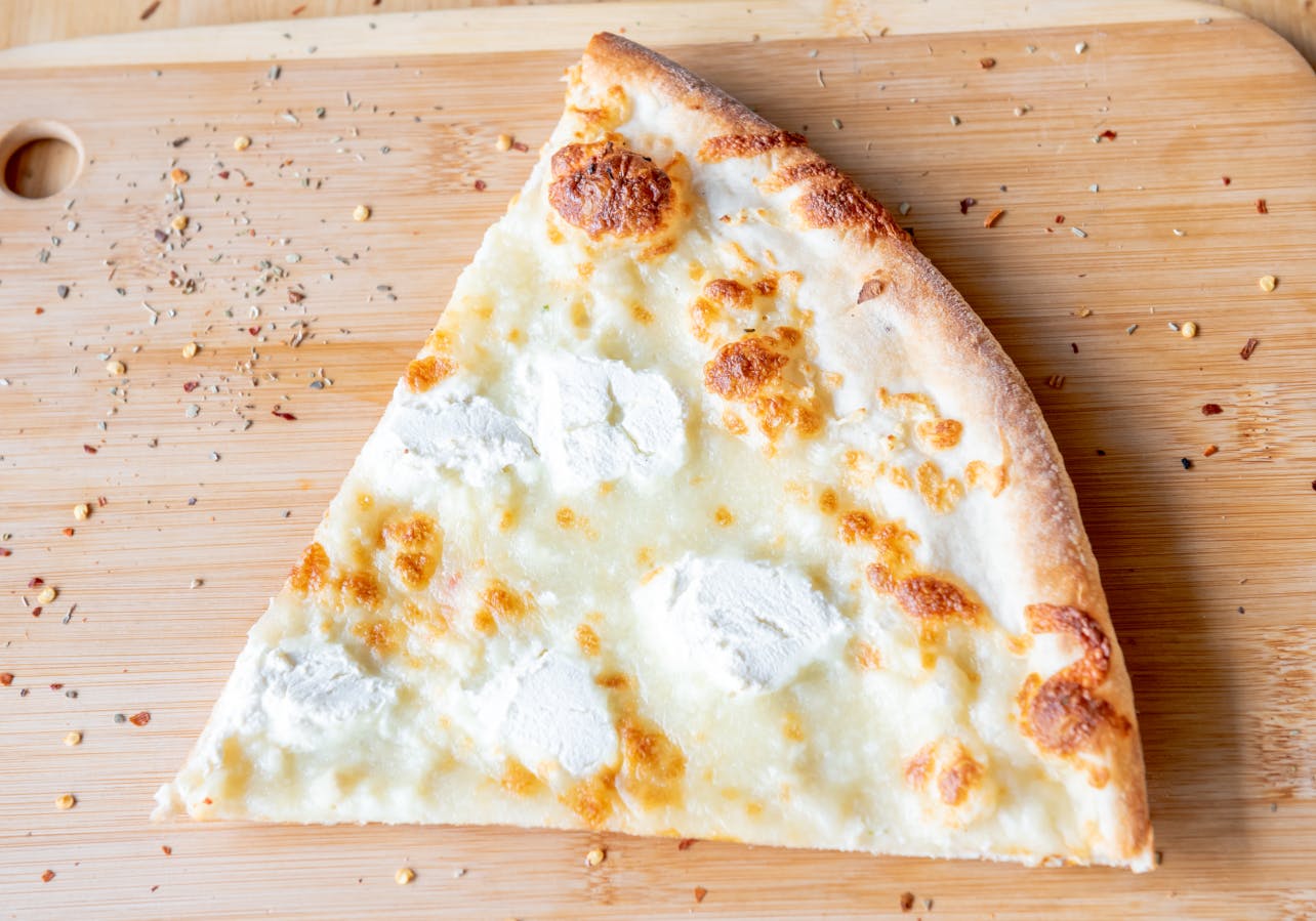 Order White Pizza - Personal food online from Italy's Restaurant & Pizzeria store, Phillipsburg on bringmethat.com