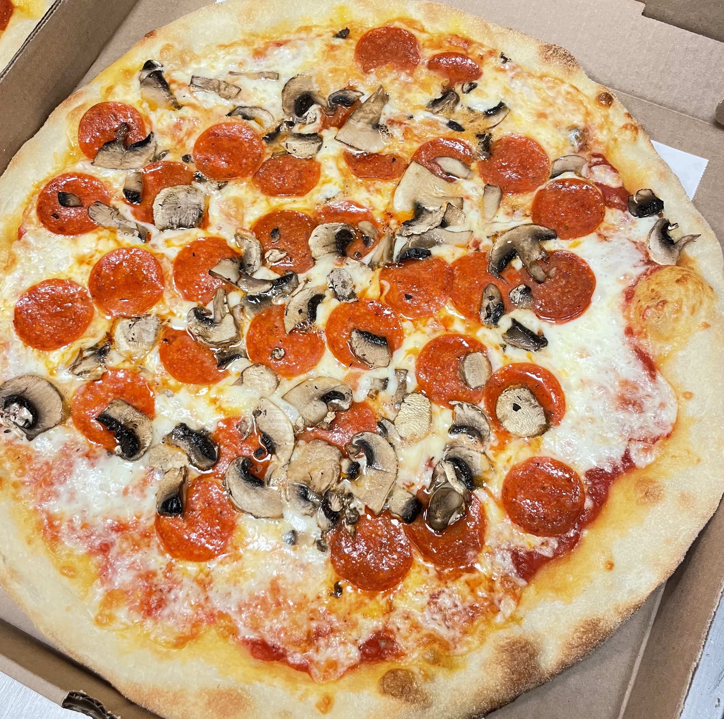 Order Slice of Pepperoni and Mushroom Pizza food online from Dolce- carini store, Philadelphia on bringmethat.com