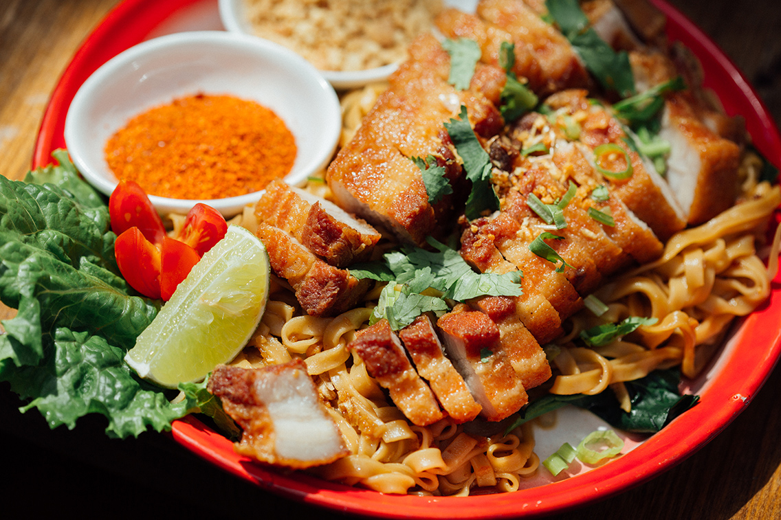 Order Bamee Moo Tod (Crispy Pork Belly with Egg Noodle)  food online from Lan Larb store, New York on bringmethat.com