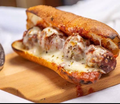 Order Meatball Sandwich food online from Gianni's Pizza store, Oceanside on bringmethat.com
