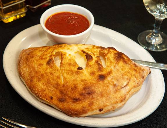 Order Cheese Calzone food online from Alberto Pizzeria Italian Restaurant store, Edgewater on bringmethat.com