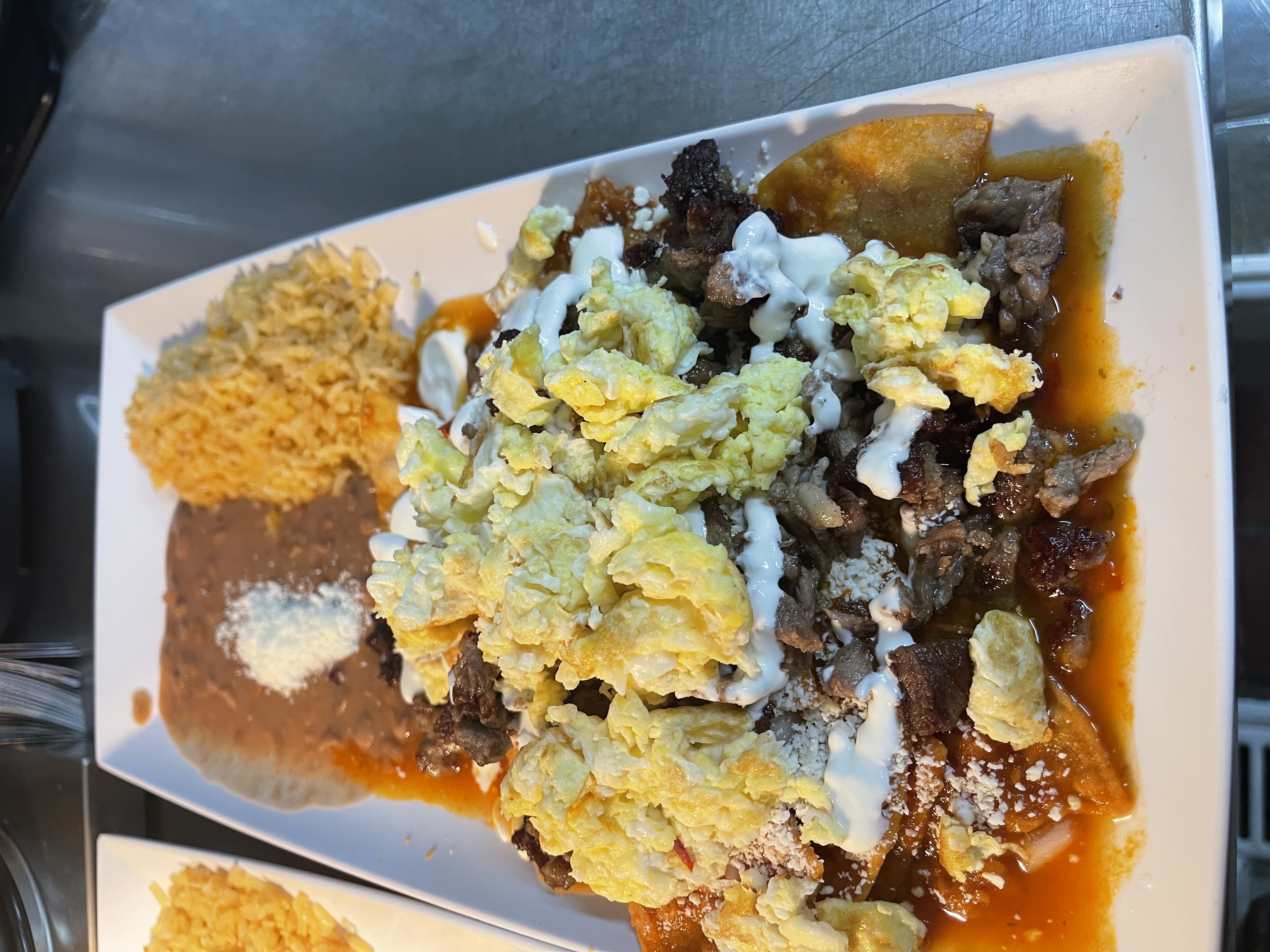 Order chilaquiles con carne food online from Sabor Mi Tierra store, Anaheim on bringmethat.com