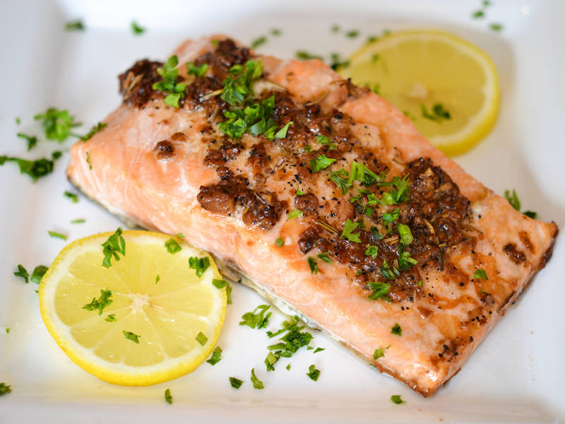 Order 14 oz. Baked Salmon food online from Texas rotisserie store, New York on bringmethat.com