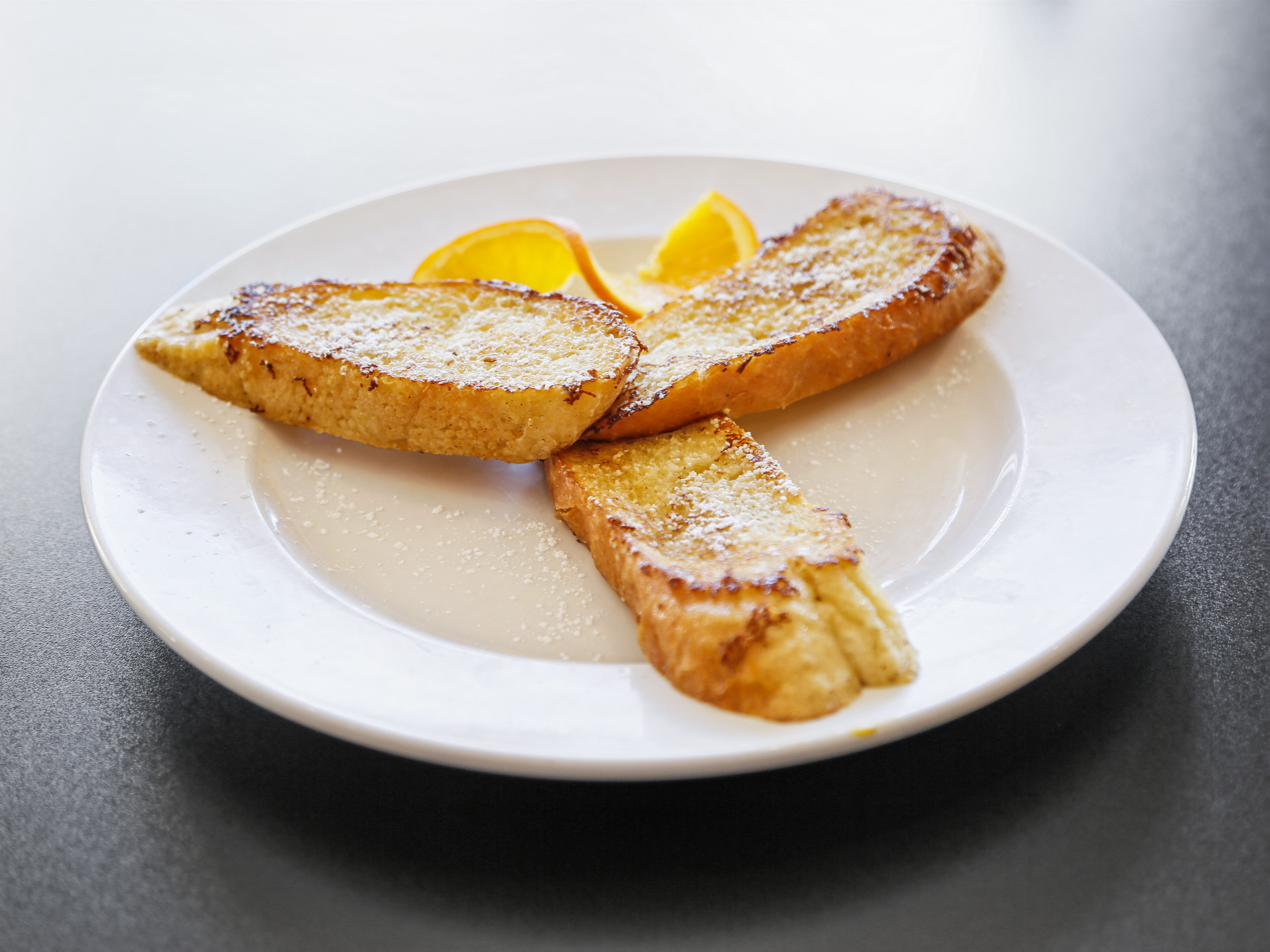 Order 3 Piece French Toast food online from Hearth Room Cafe store, Town and Country on bringmethat.com