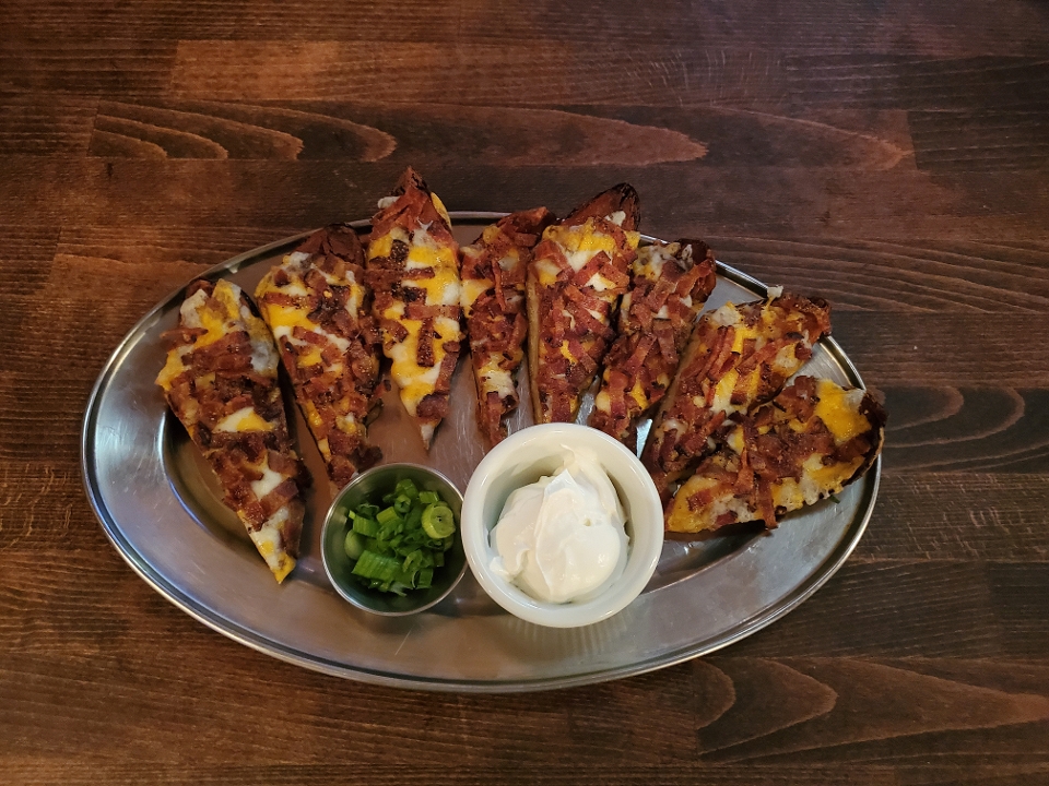 Order Loaded Potato Skins food online from Saddle Ranch Chop House store, West Hollywood on bringmethat.com