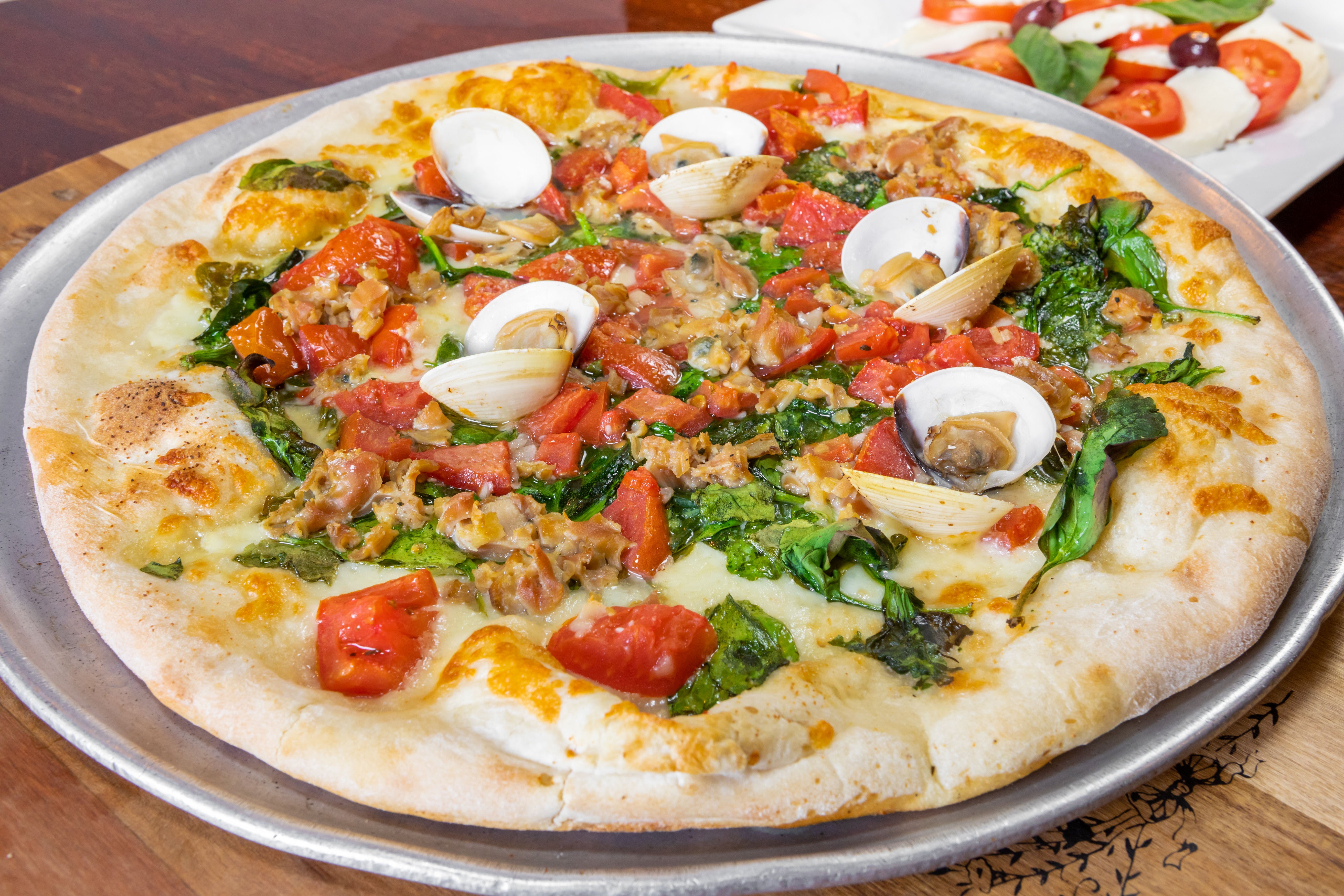 Order Spinach, Tomato & Clams Pizza - Personal food online from Capri Restaurant store, Natrona Heights on bringmethat.com