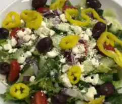 Order Greek Salad food online from White Cottage Pizzeria store, Wood Dale on bringmethat.com