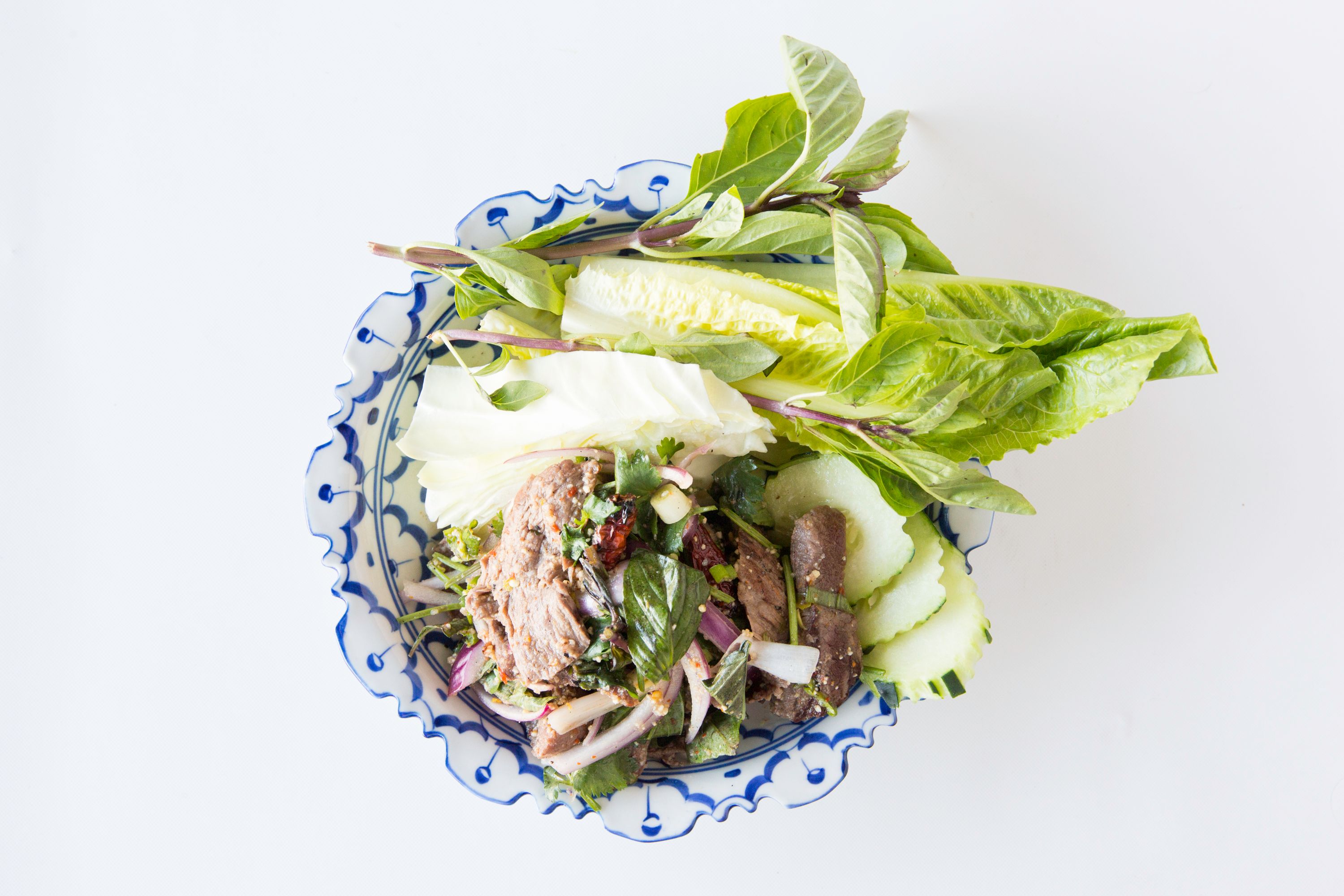Order Neua Nam Tok Spicy Salad food online from Chao Krung Restaurant store, Los Angeles on bringmethat.com