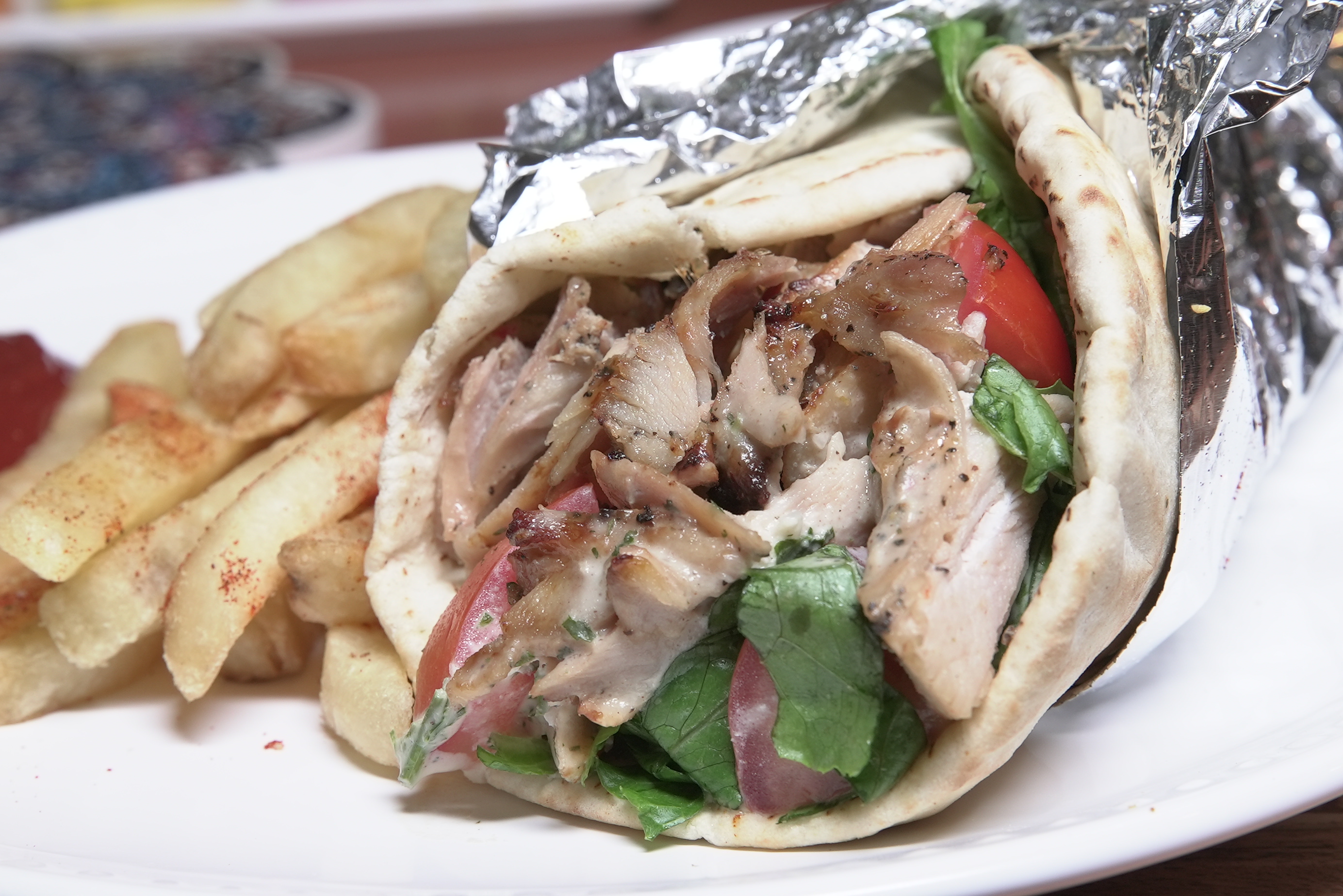 Order Chicken Shawarma Wrap food online from Shish mediterranean catering store, Studio City on bringmethat.com