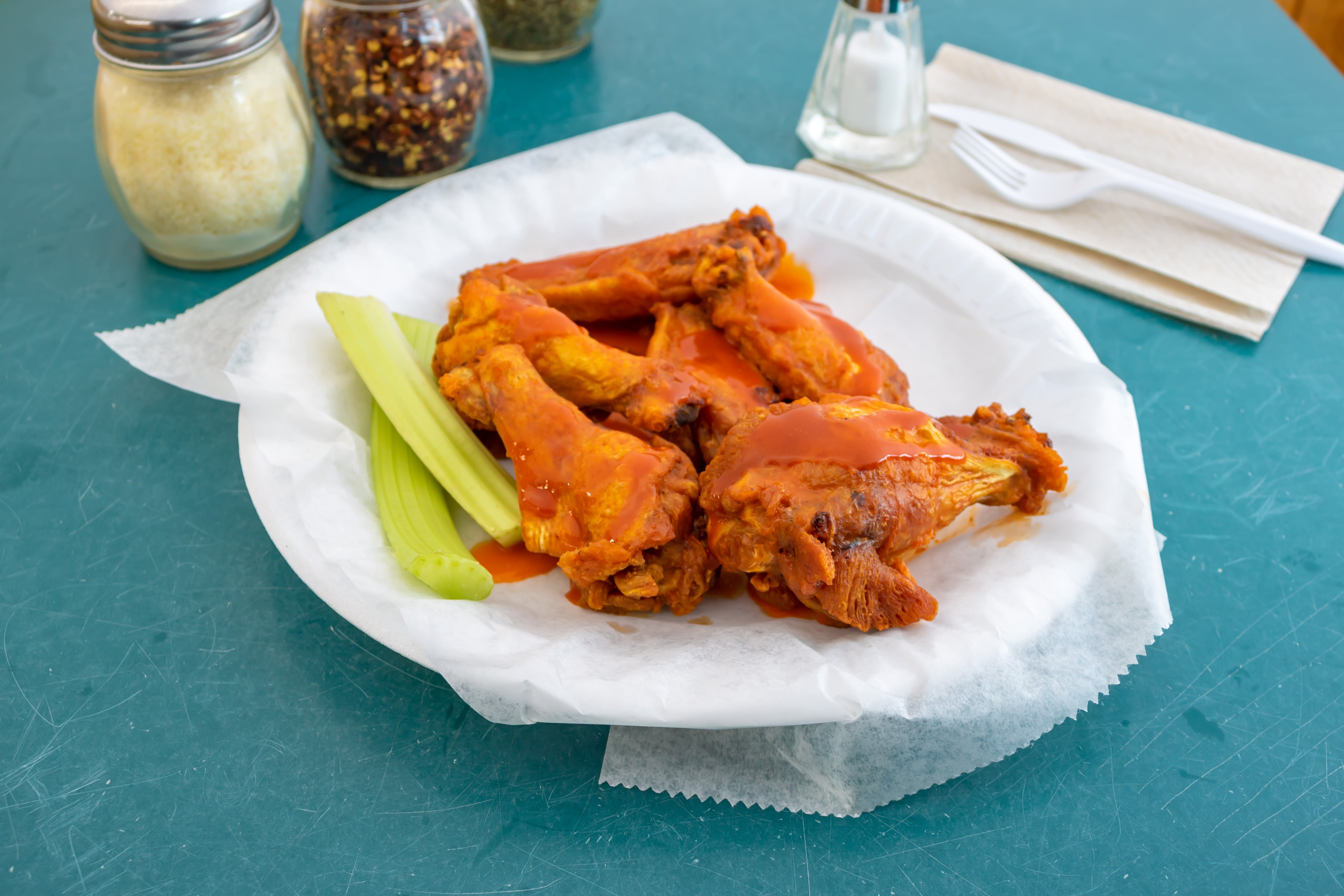 Order Jumbo Wings - 6 Pieces food online from T J's Pizza & Pasta store, Lawrence on bringmethat.com