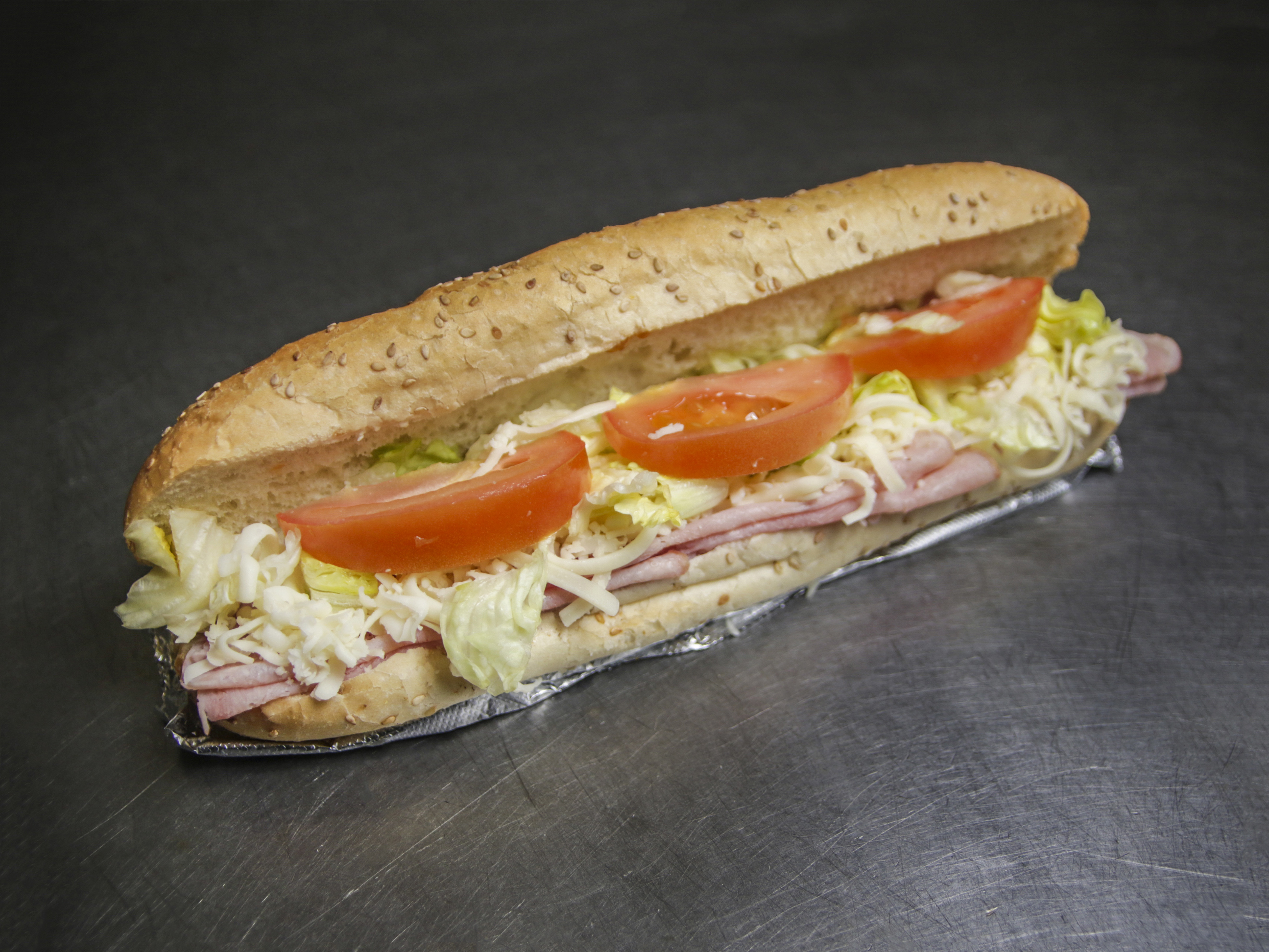 Order Ham and Cheese Deluxe Sub food online from Toarmina Pizza store, Madison Heights on bringmethat.com