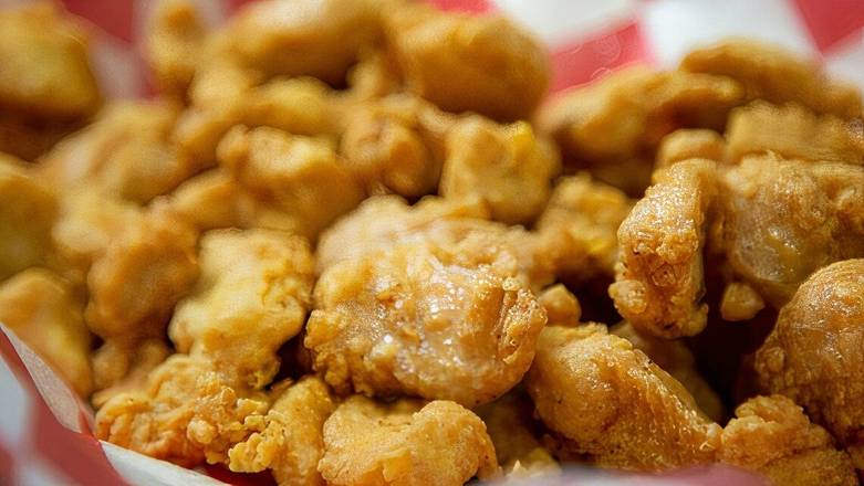 Order Large Popcorn Chicken food online from Holy Buckets store, Bridgeview on bringmethat.com