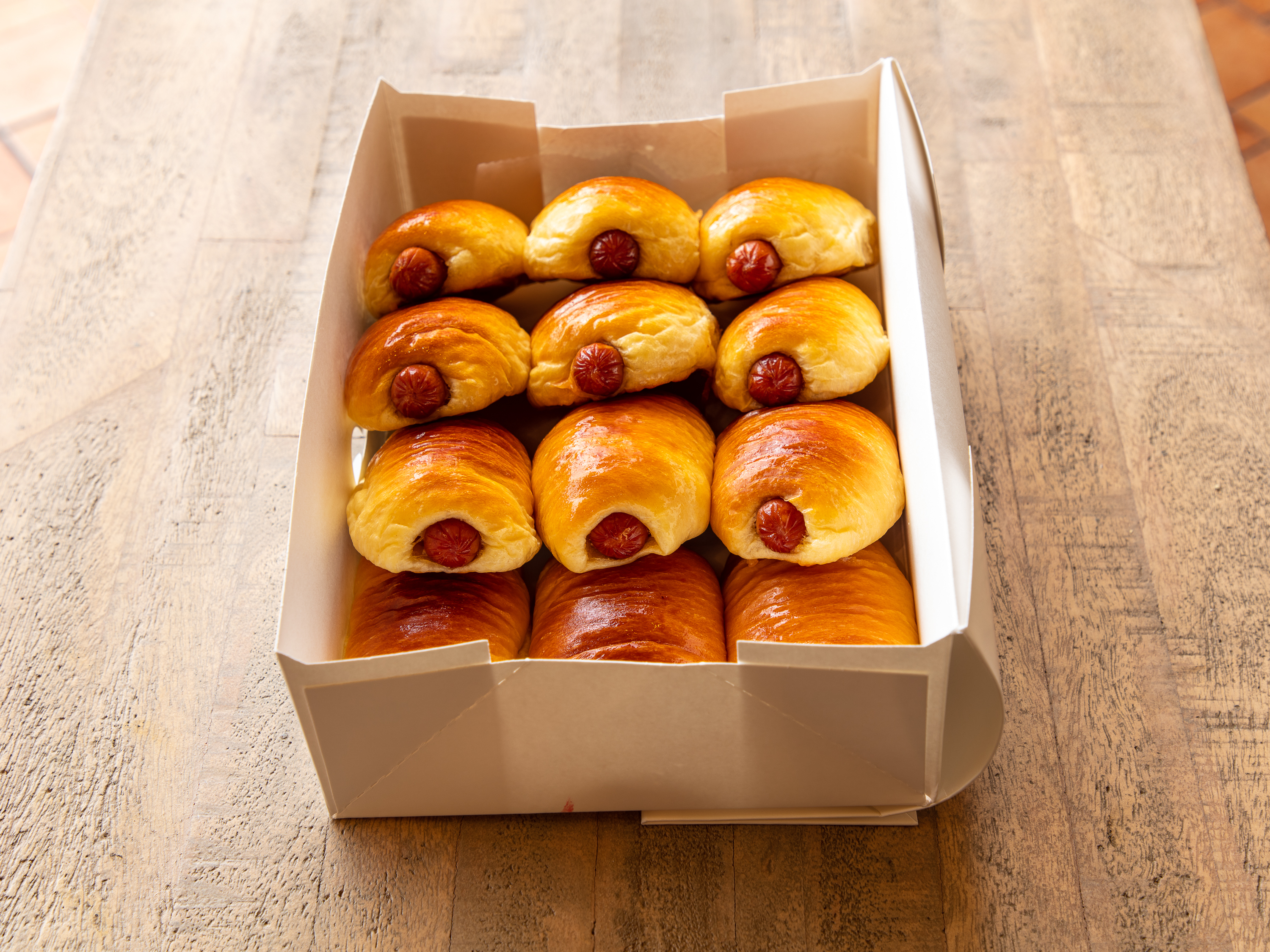 Order 1 Dozen Sausage Rolls food online from Donna Donuts store, Keller on bringmethat.com