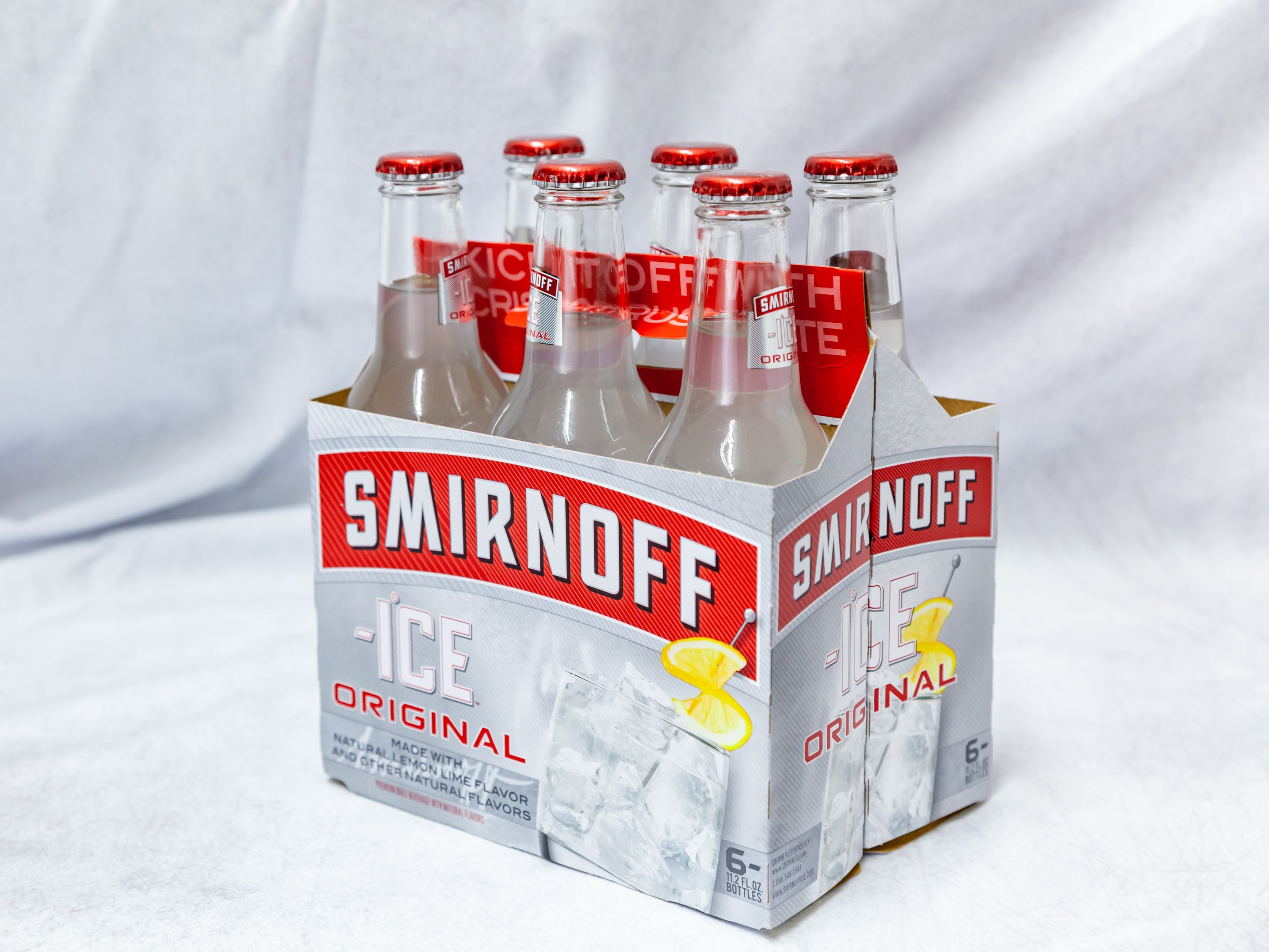 Order 6 Pack Bottle Smirnoff Ice  food online from Gallaghers Drive-In Liquor store, Oakland on bringmethat.com