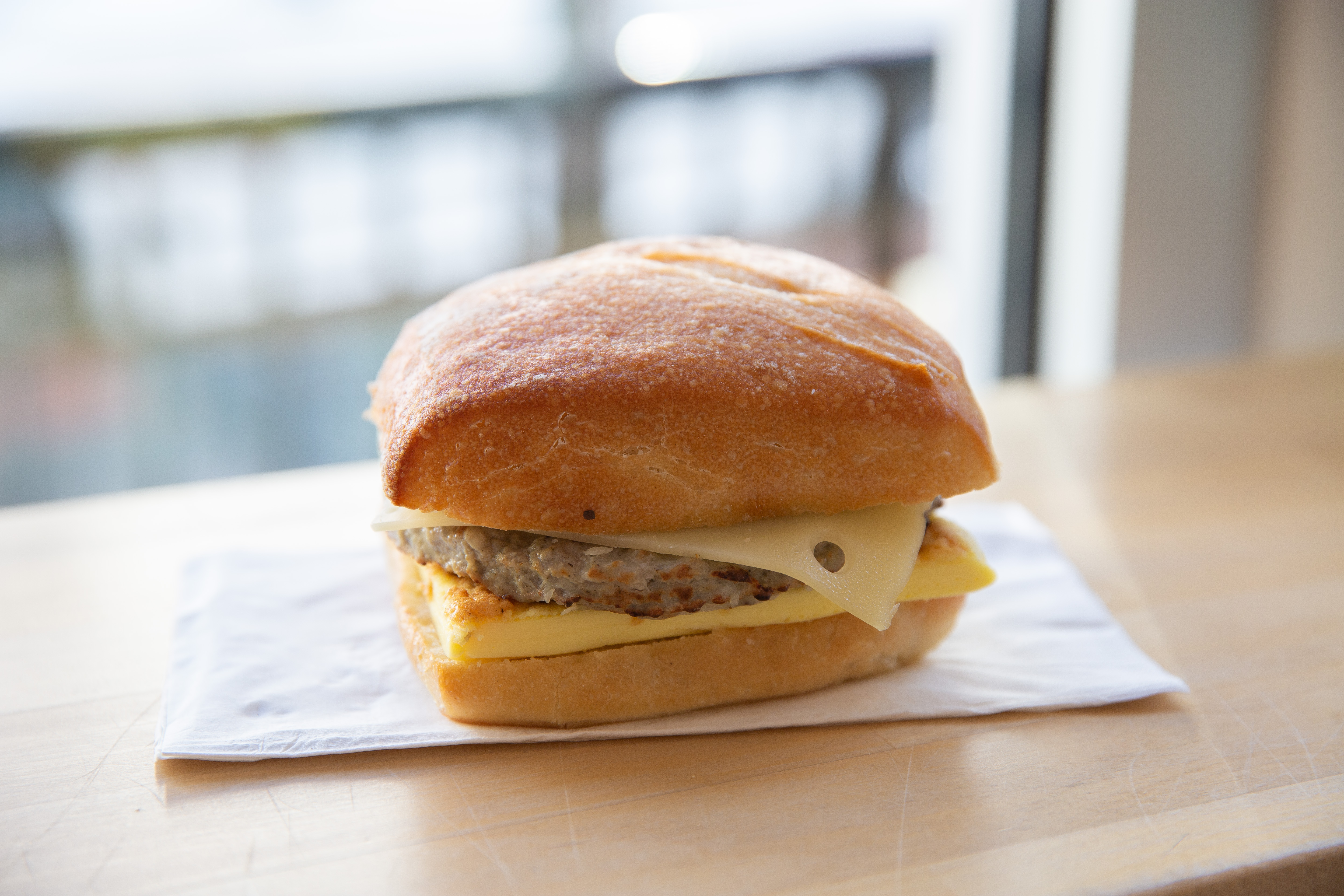Order Sausage Breakfast Sandwich food online from Kafe store, Forest Grove on bringmethat.com