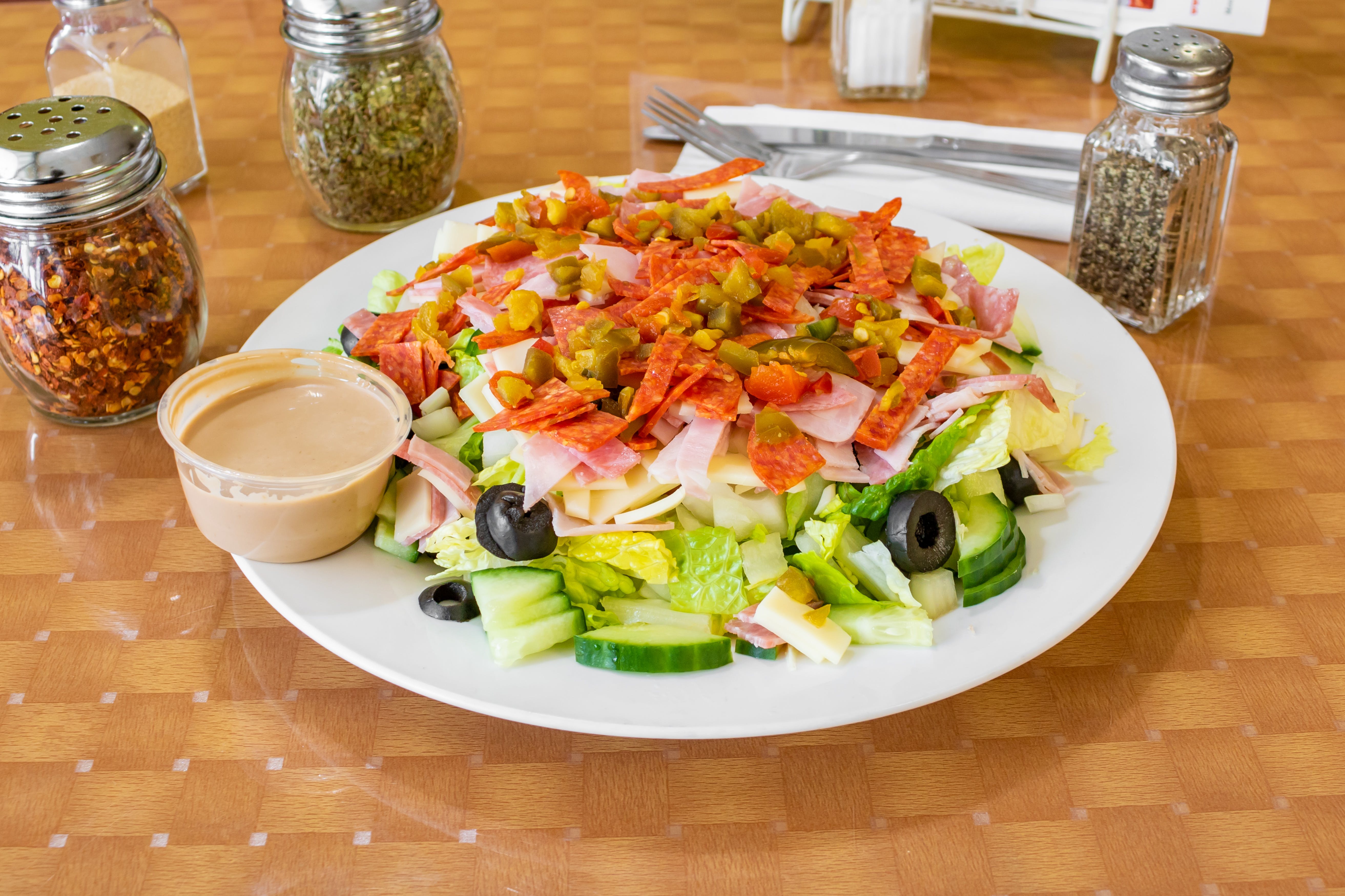 Order Chopped Antipasto Salad - Salad food online from Danny's Tomato Pie store, Ewing on bringmethat.com