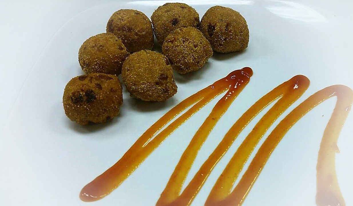 Order Hush Puppies food online from Louisiana Cafe store, Old Town Manassas on bringmethat.com
