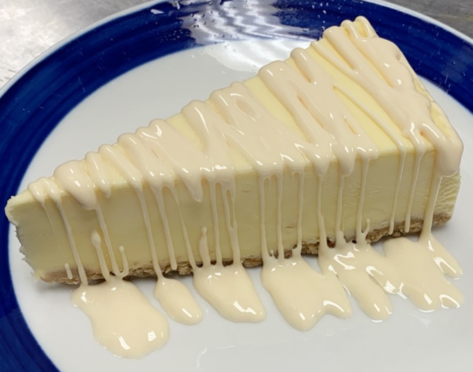 Order vanilla topping over cheesecake food online from Roma - Pizza and Pasta store, Nashville on bringmethat.com