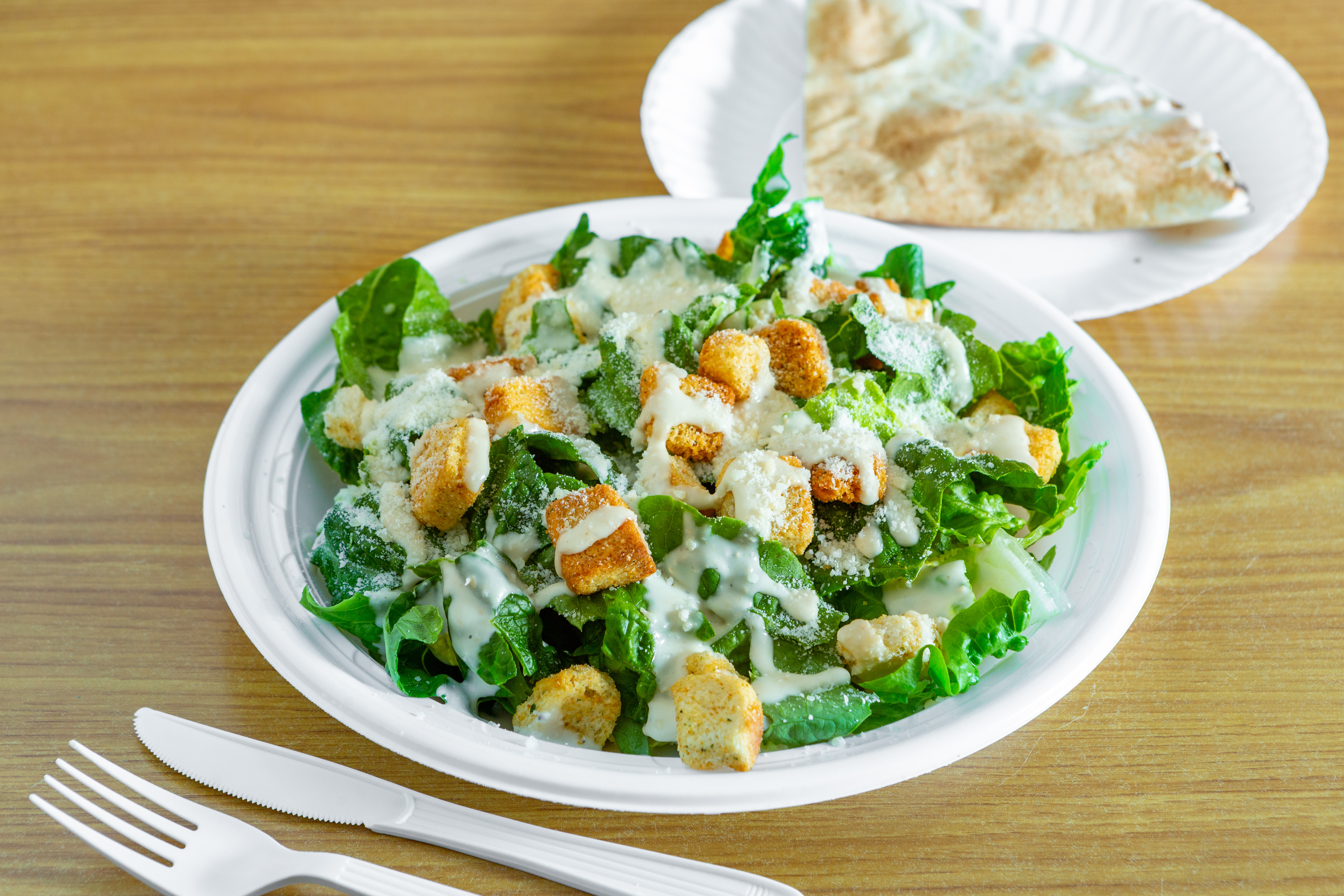 Order Caesar Salad food online from Inbound Pizza store, Allston on bringmethat.com