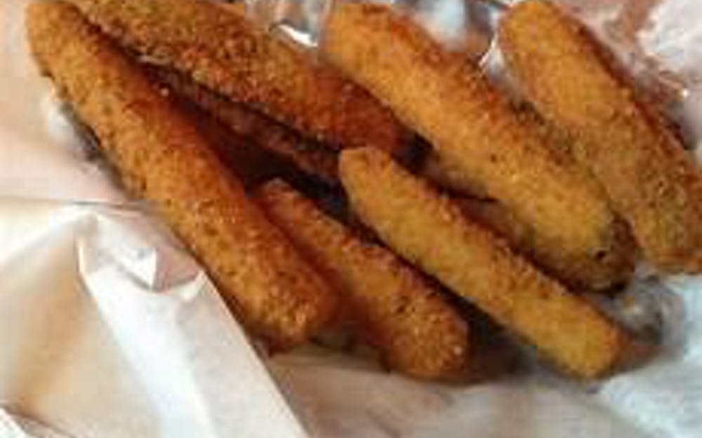 Order Zucchini Sticks - Appetizer food online from Pino's Pizzeria store, Easton on bringmethat.com