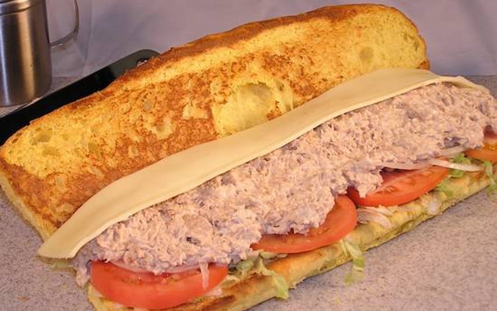 Order Tuna Fish Sub - Half food online from Cal'z Pizza Subs and Chicken Wings store, Virginia Beach on bringmethat.com