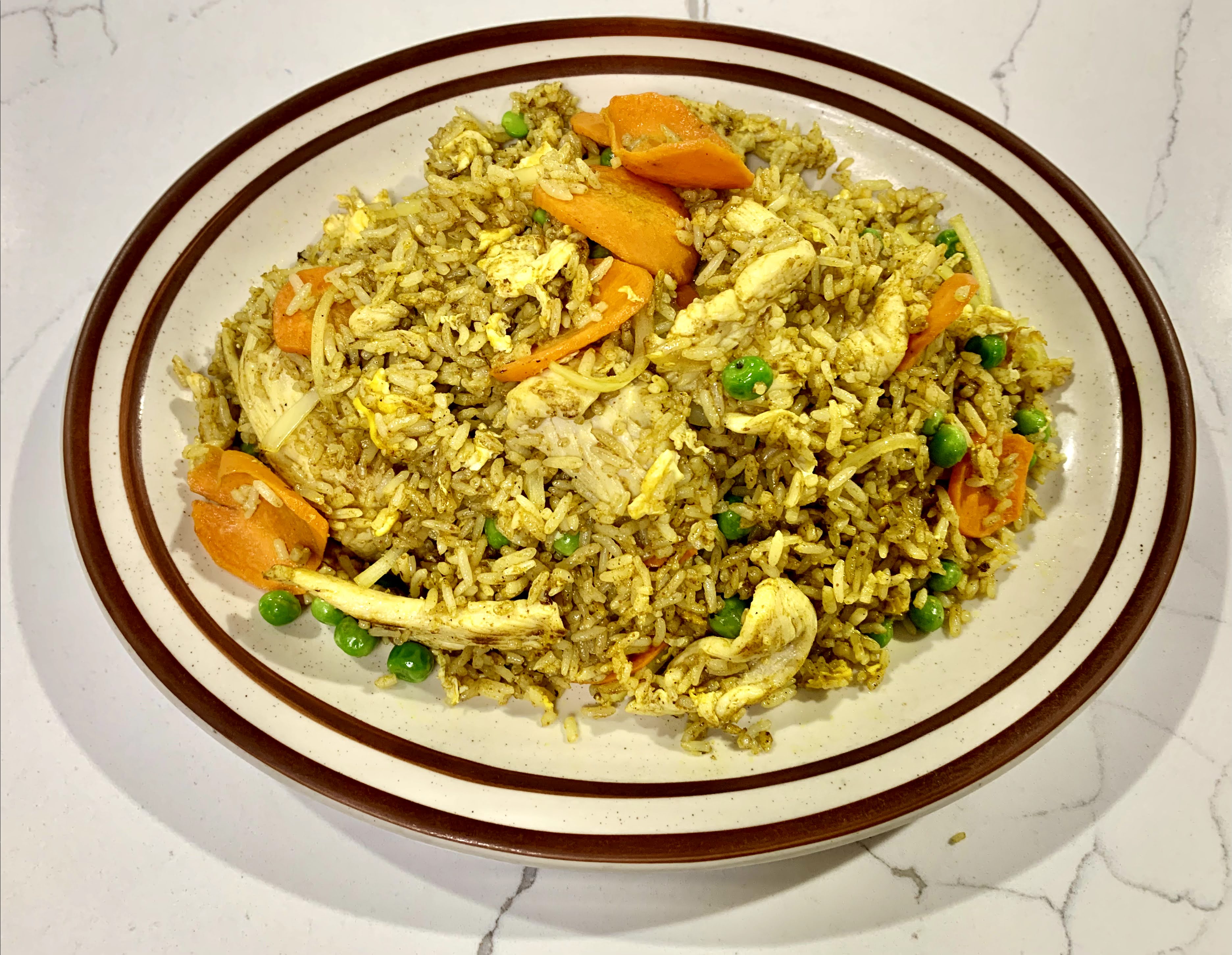 Order C27. Curry Fried Rice food online from Thai Noodles Cafe store, Libertyville on bringmethat.com