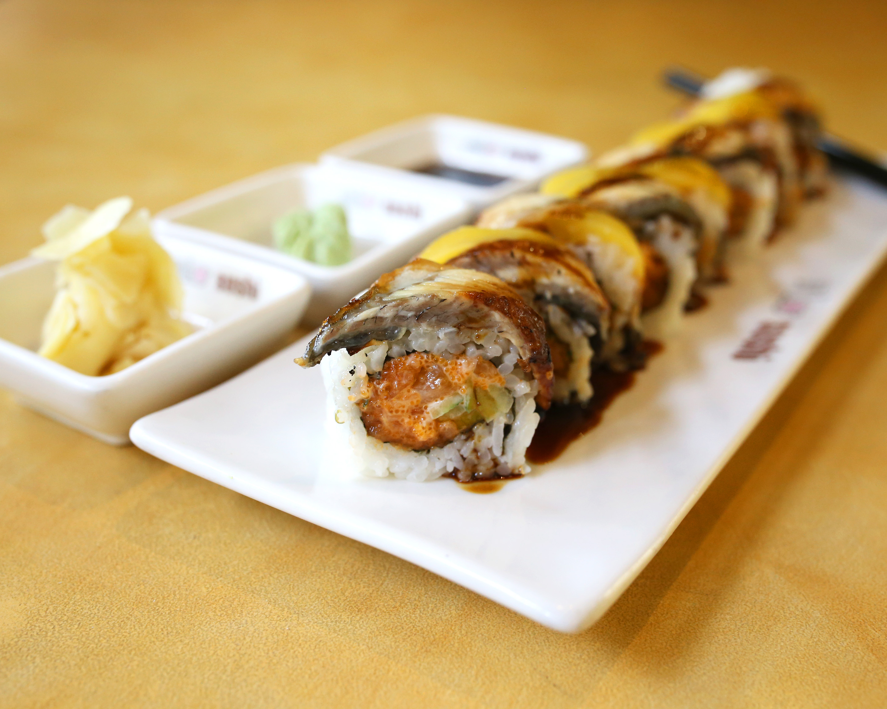Order Dragon Mango Roll food online from Mio Sushi store, Beaverton on bringmethat.com