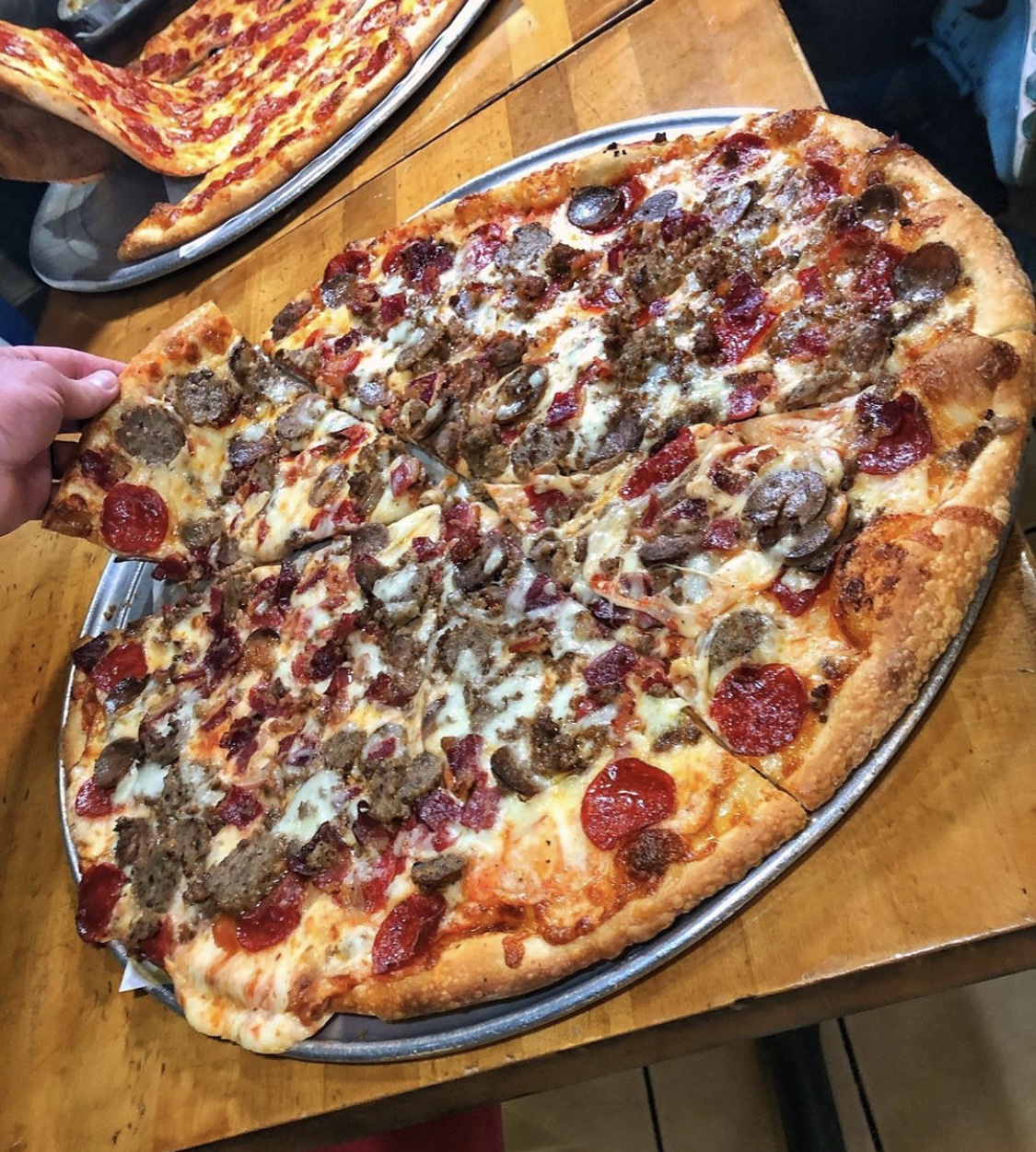 Order Meat Lover Pizza (one size 18") food online from East Village Pizza & Kebabs store, New York on bringmethat.com