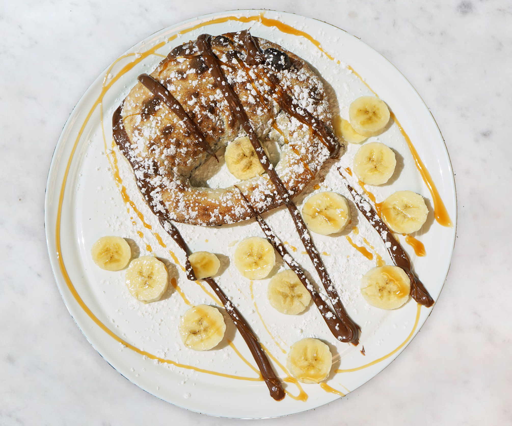 Order Nutella Calzone with Fresh Bananas food online from MidiCi store, Orem on bringmethat.com