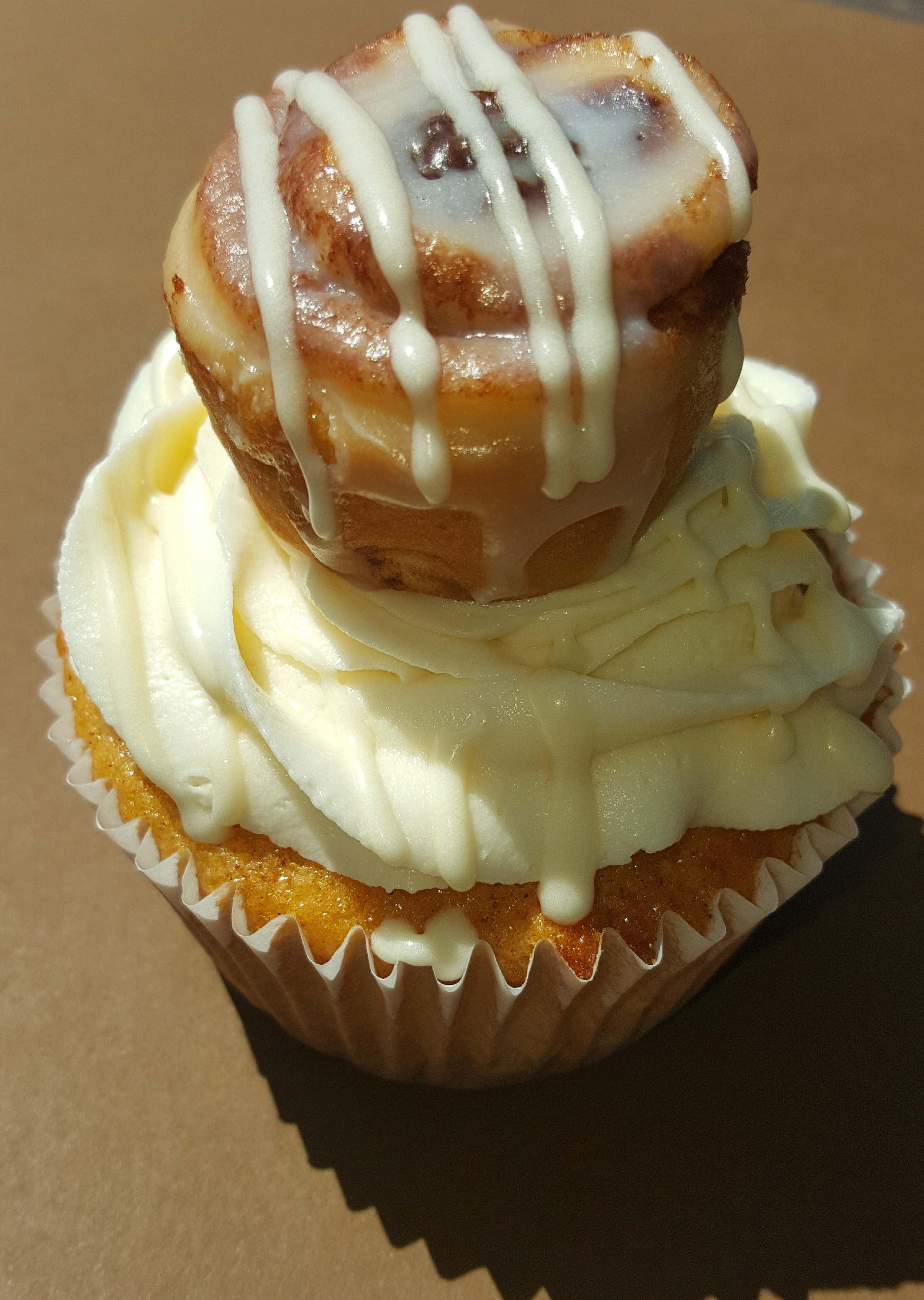 Order Cinnamon roll cupcake food online from Cynthia Kitchen store, Humble on bringmethat.com