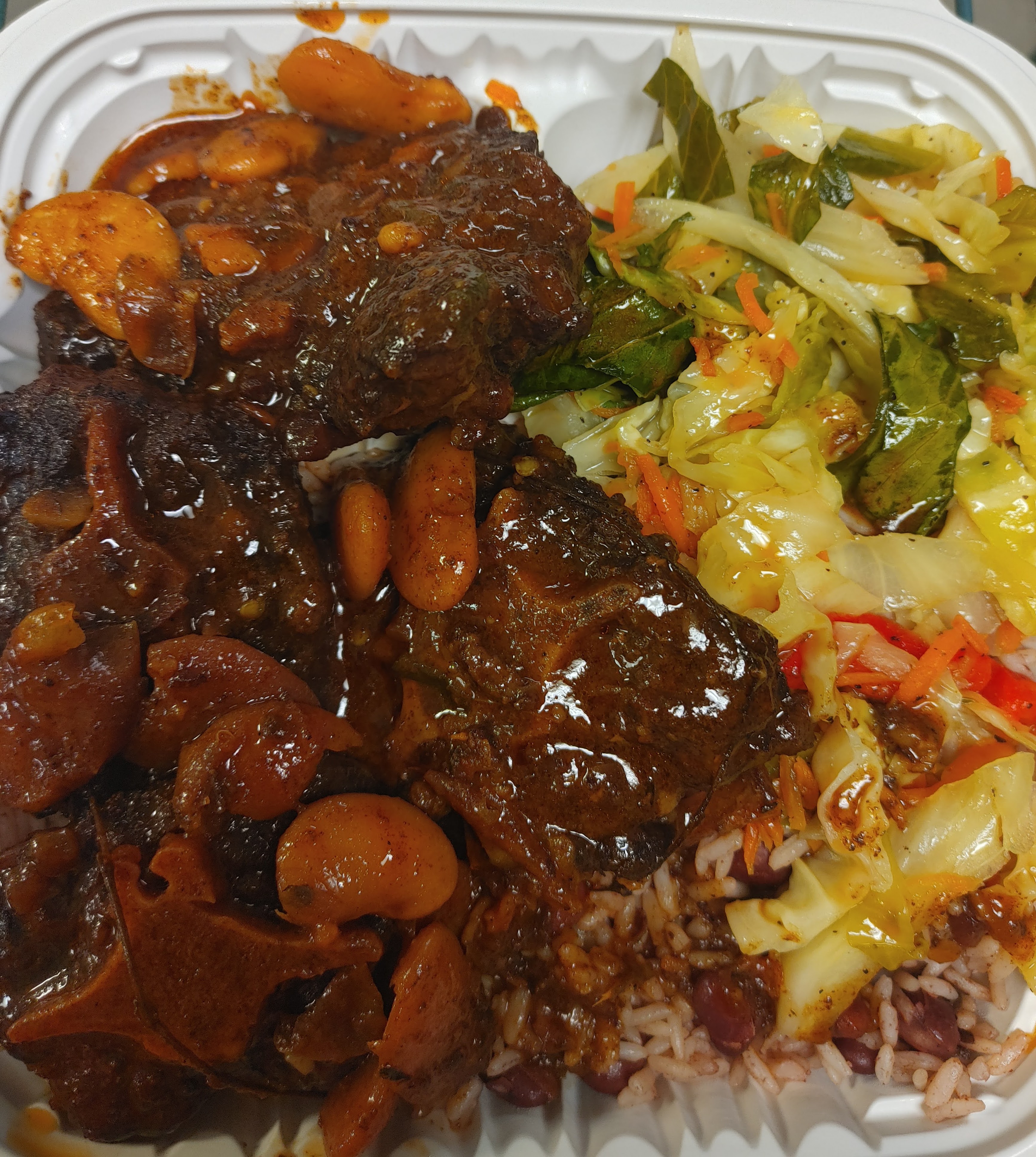 Order Oxtails and beans food online from Nelz Jamaican Food And Wings store, York on bringmethat.com