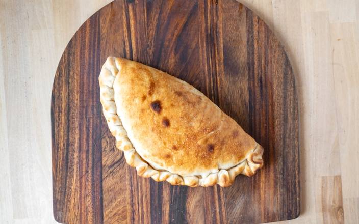 Order Veggie Calzone food online from Pazza Pizza store, Chicago on bringmethat.com