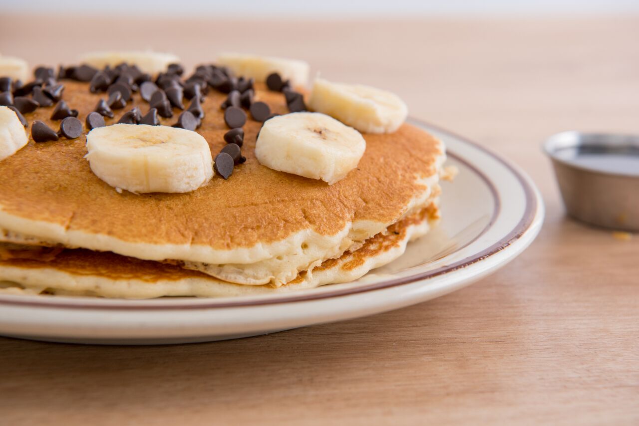 Order Chocolate Chip with Banana Pancakes food online from Canter Deli store, Los Angeles on bringmethat.com