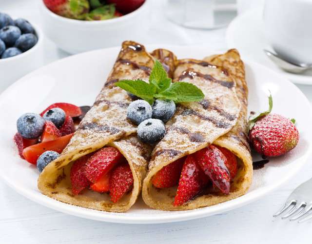 Order Russian style crepes with fruits food online from Masha and the Bear store, Aurora on bringmethat.com