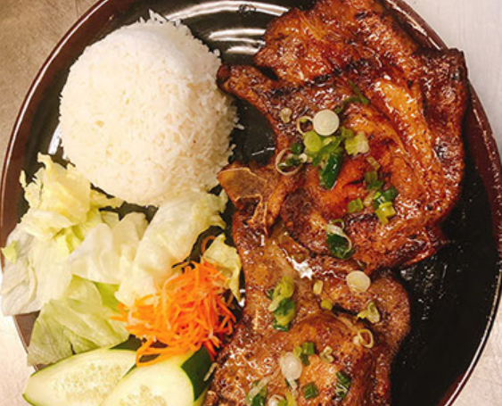 Order 40. 2 Grilled Pork Chops with Steamed Rice food online from Ngon Noodle House store, Antioch on bringmethat.com