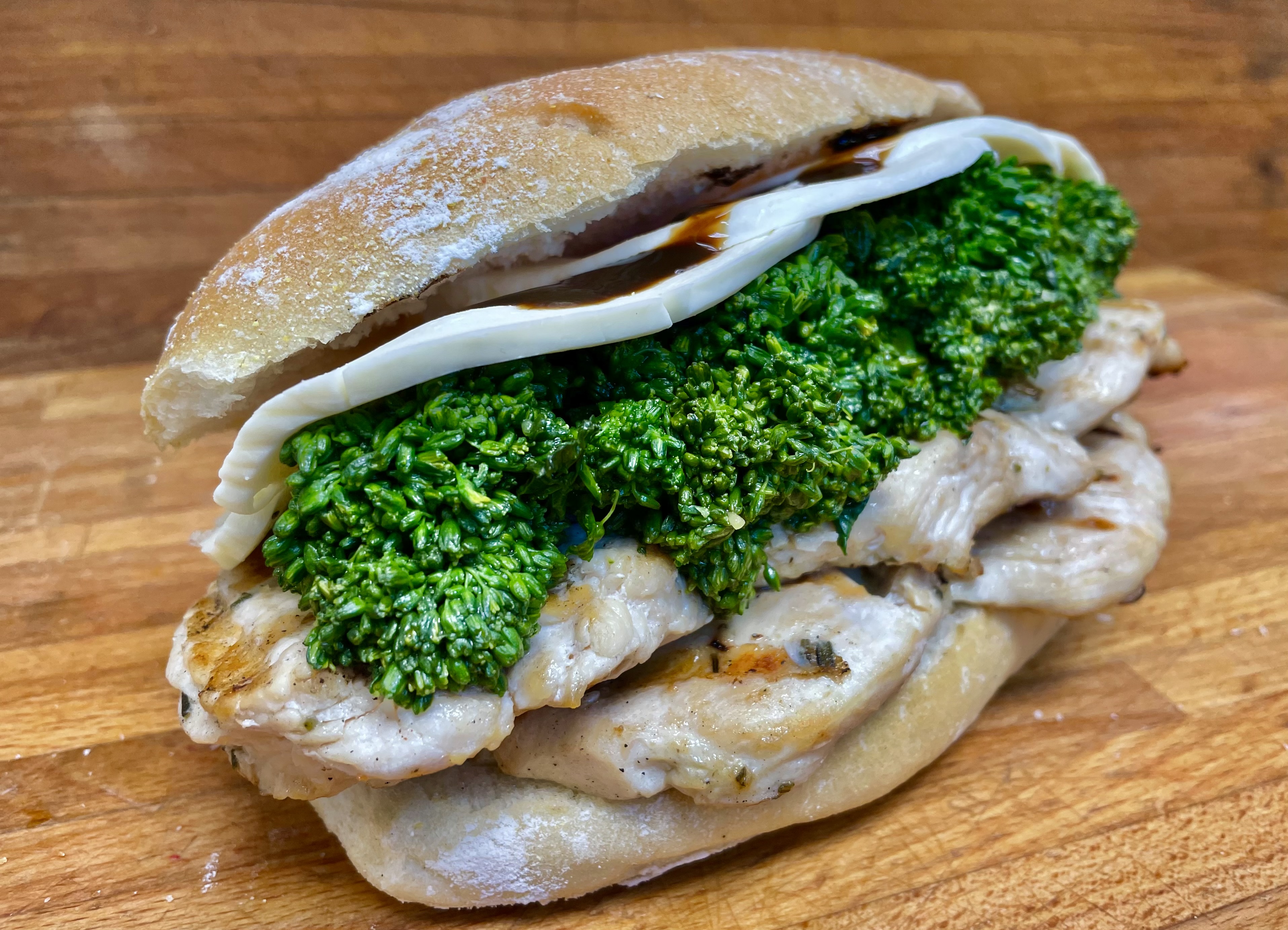 Order 11. Grilled Chicken w/ Broccoli Rabe & fresh Mozz food online from Pastosa's store, Staten Island on bringmethat.com