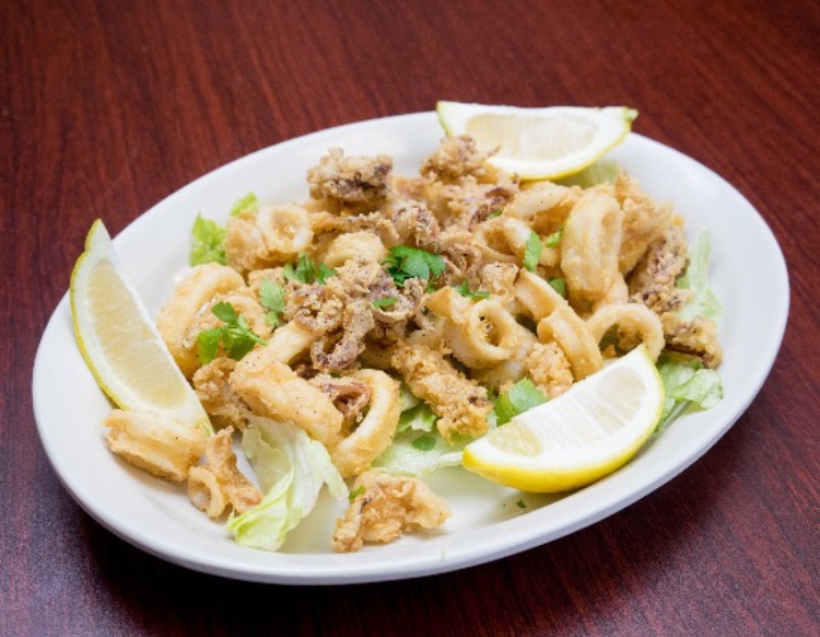Order Fried Calamari food online from Papa Santiago's Pizzeria store, Chicago on bringmethat.com