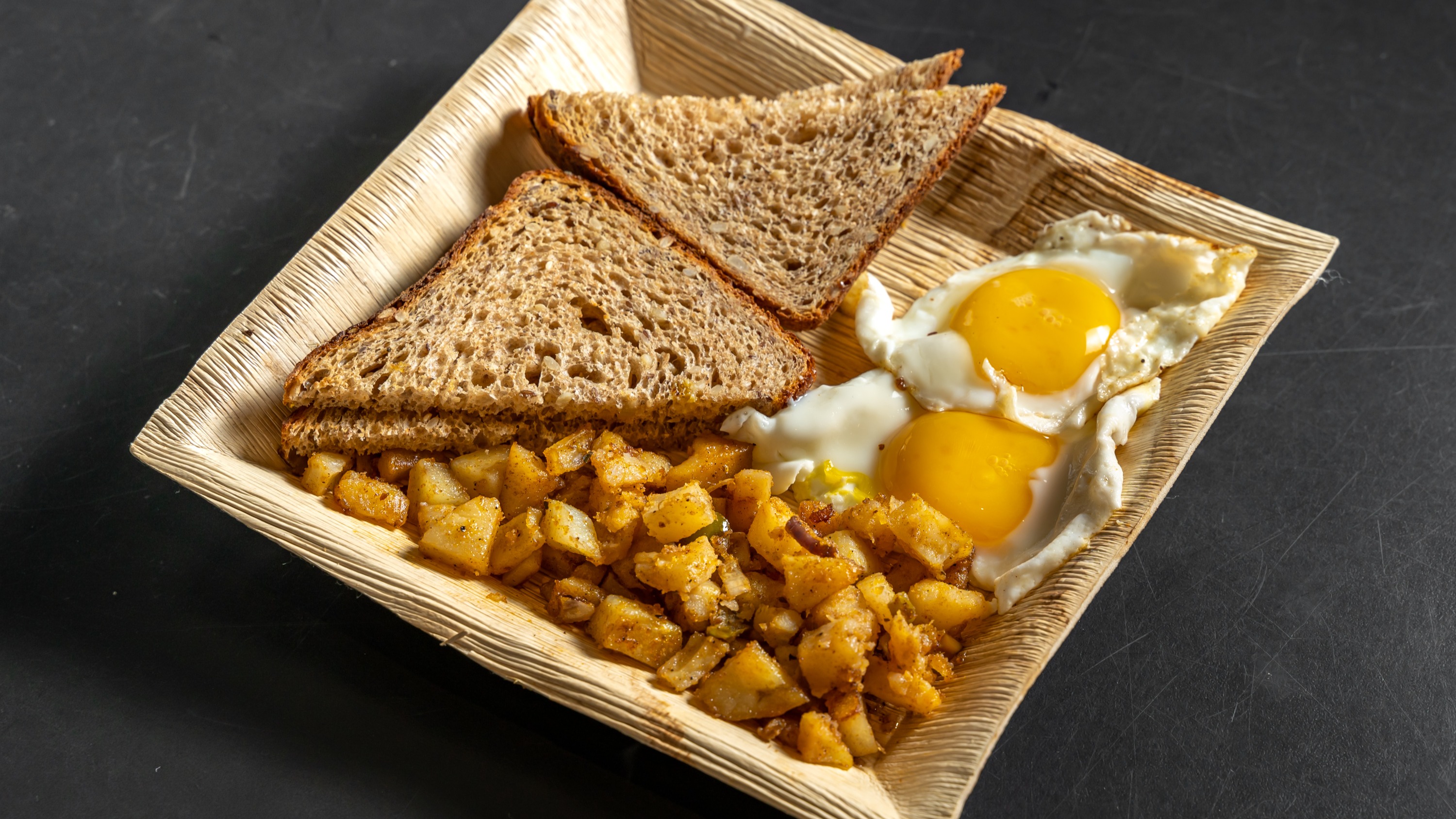 Order 2 Eggs Any Style Platter with Homefries food online from Veritable store, New York on bringmethat.com