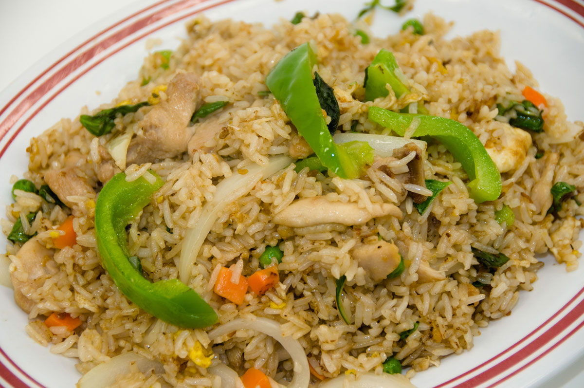 Order 26. Basil Fried Rice Chicken food online from Thai Basil Cuisine store, Berkeley on bringmethat.com