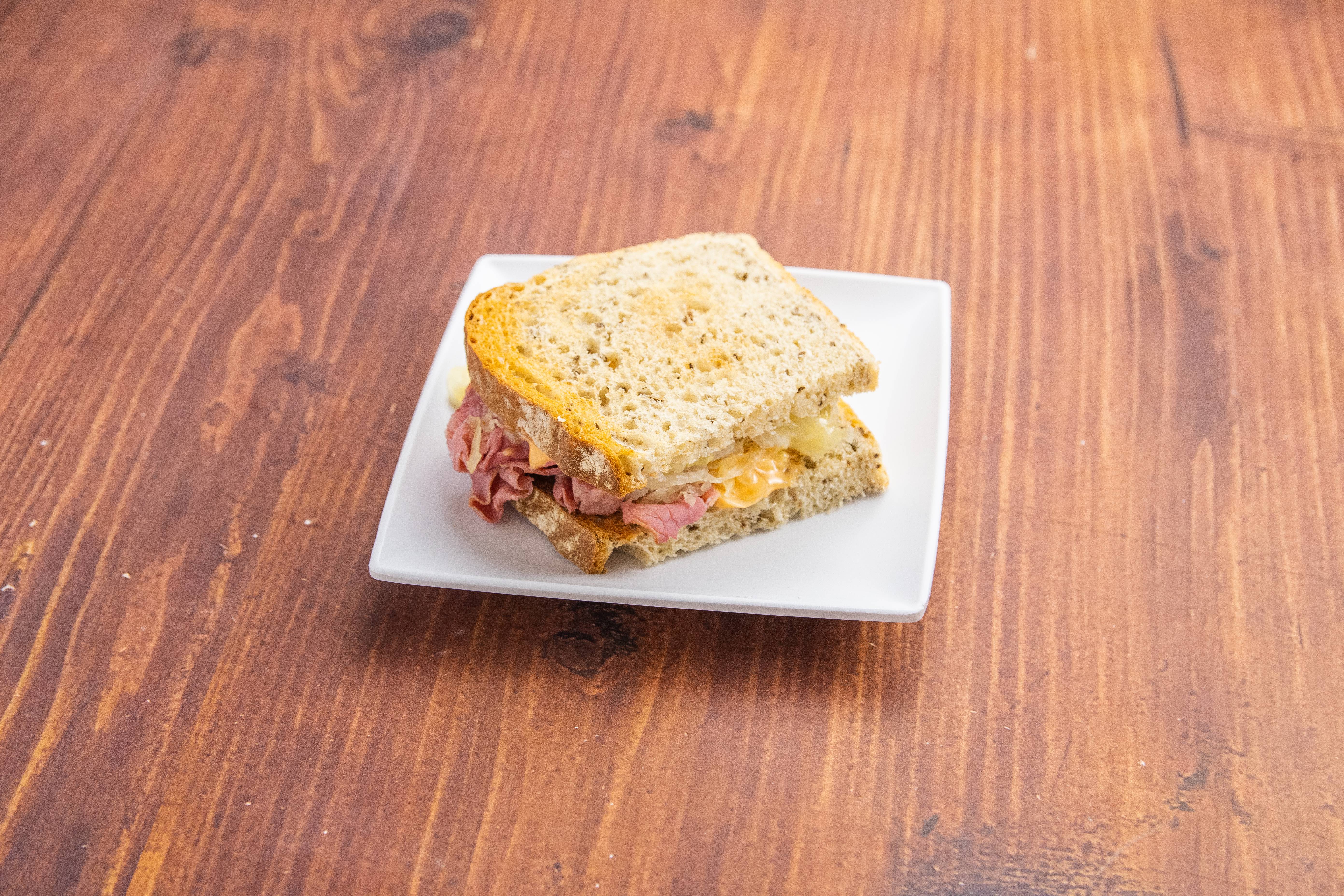 Order Classic Reuben Sandwich food online from Lovebirds Cafe & Bakery store, Alhambra on bringmethat.com