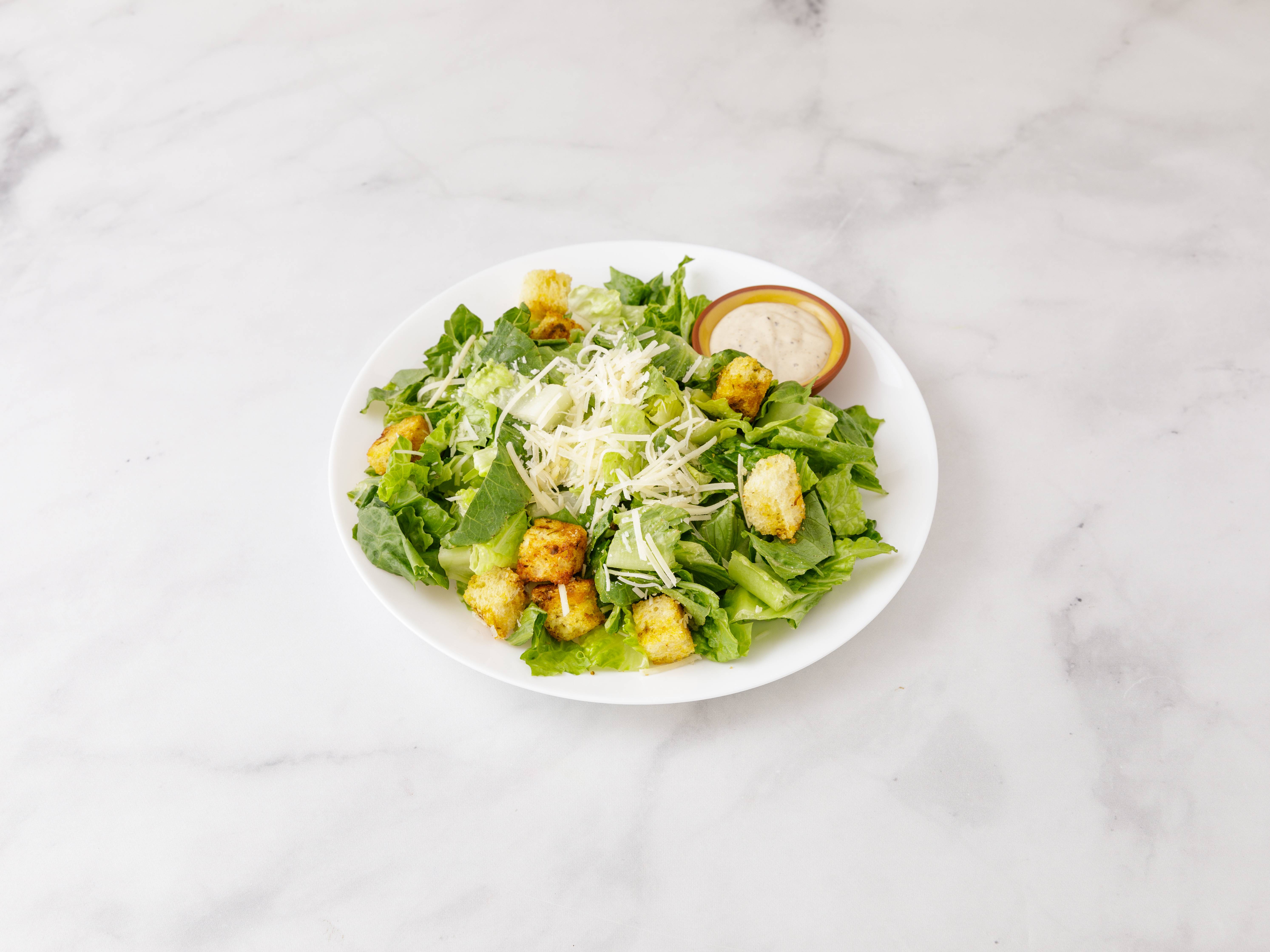 Order Caesar Salad food online from Woodstone Pizza Bar & Grill store, Rochelle Park on bringmethat.com