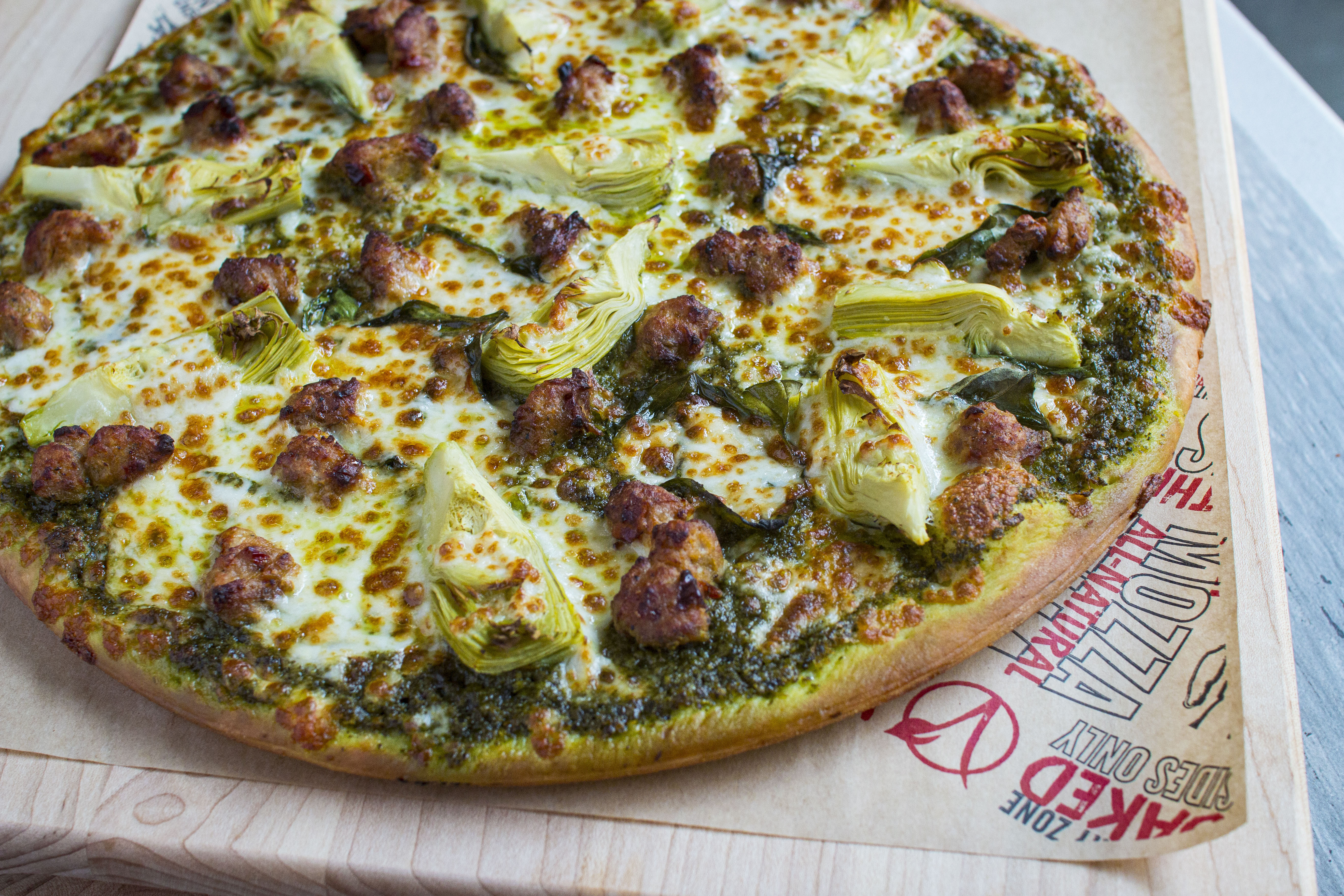Order Chicken Sausage, Artichoke, and Pesto Pizza-Medium food online from Fresh Brothers store, Burbank on bringmethat.com