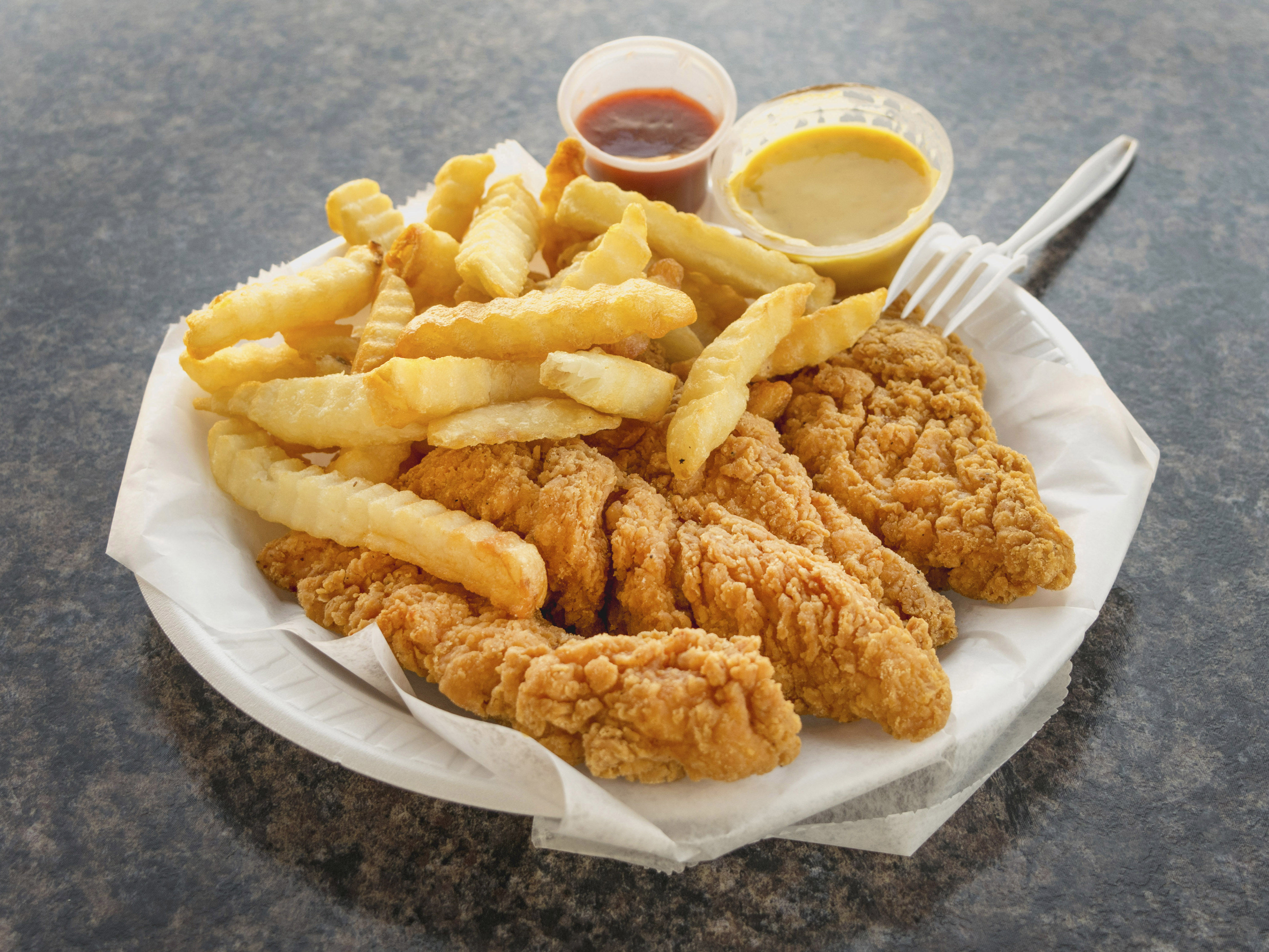 Order Chicken Tenders with French Fries food online from Chicken Delight store, Westbury on bringmethat.com